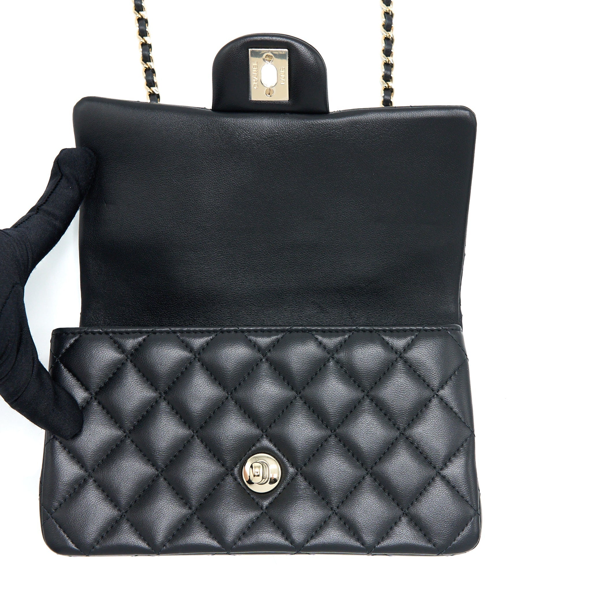 chanel-22p-top-handle-mini-rectangular-with-lion-charm-lghw-microchip