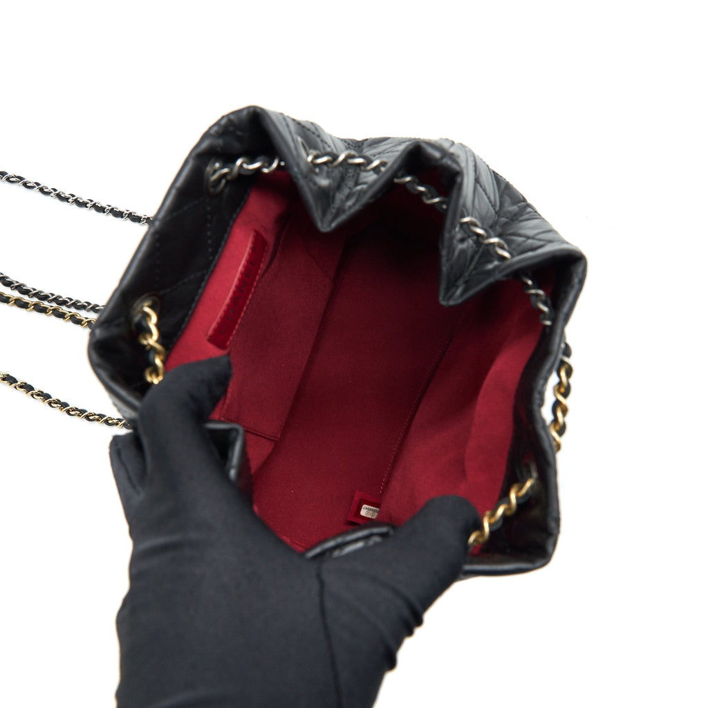 chanel-gabrielle-backpack-medium-quilted-calfskin-black-gold-sliver-hw