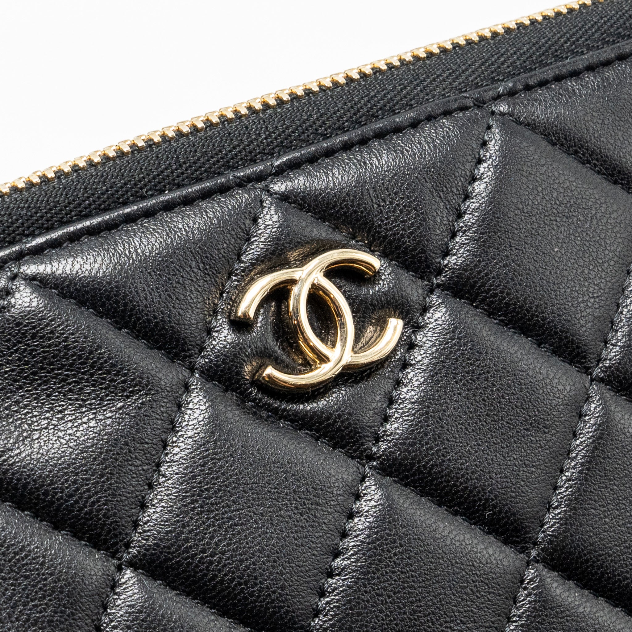 chanel-coco-charms-quilted-pouch-bag-lambskin-black-ghw