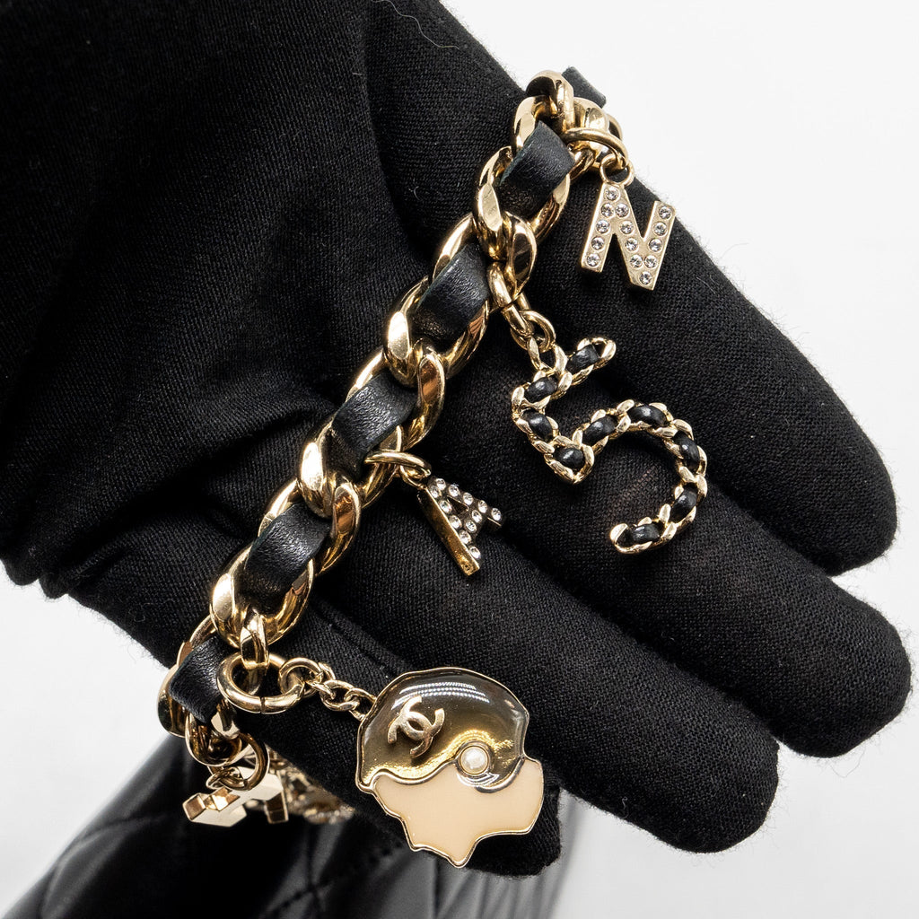 chanel-coco-charms-quilted-pouch-bag-lambskin-black-ghw