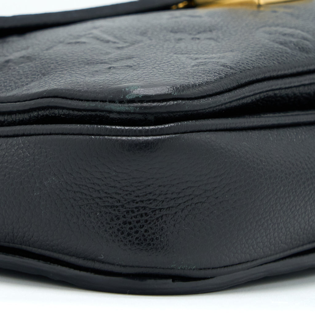 louis-vuitton-pochette-metis-monogram-empreinte-black-ghw-3