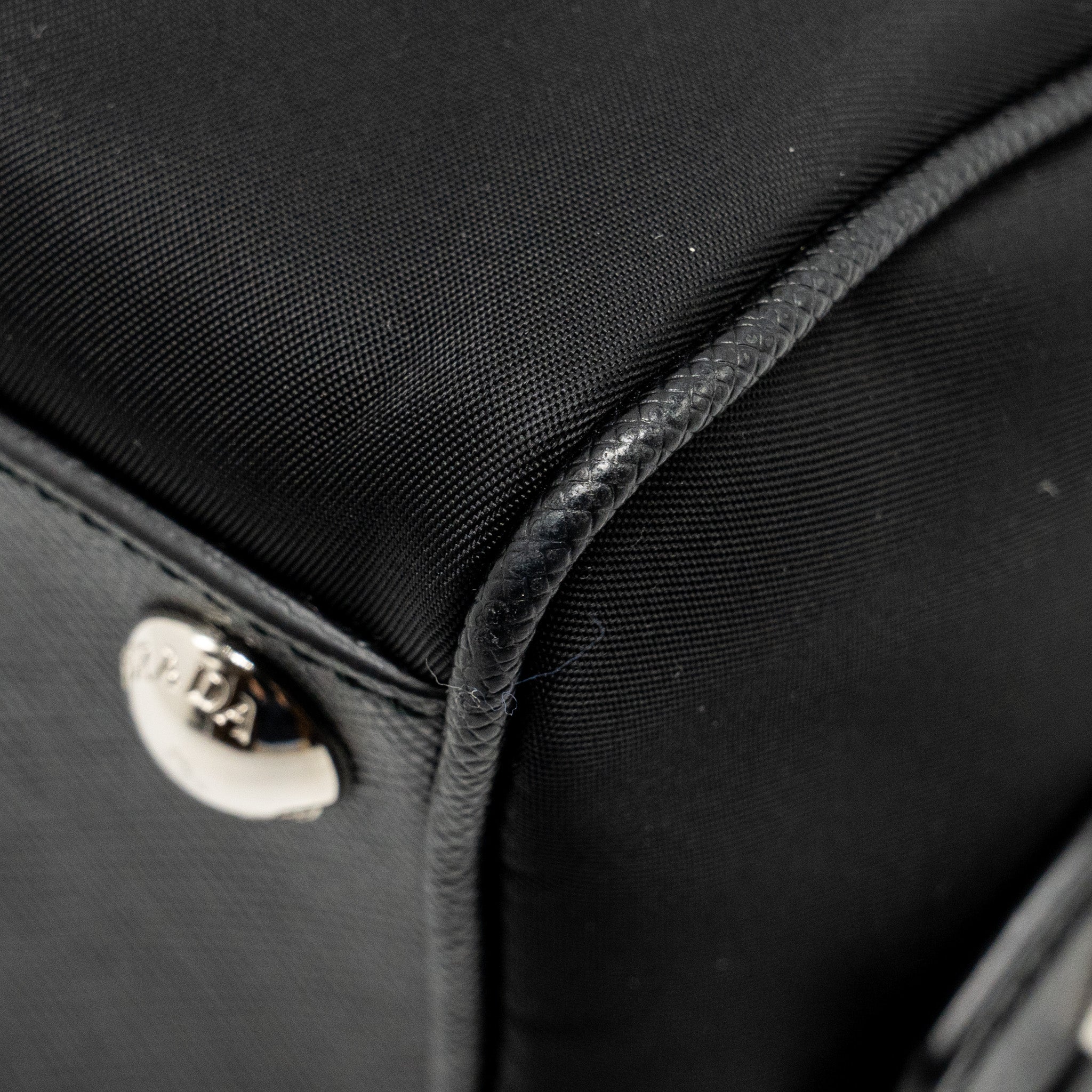 prada-top-handle-re-edition-2005-nylon-bag-black-shw