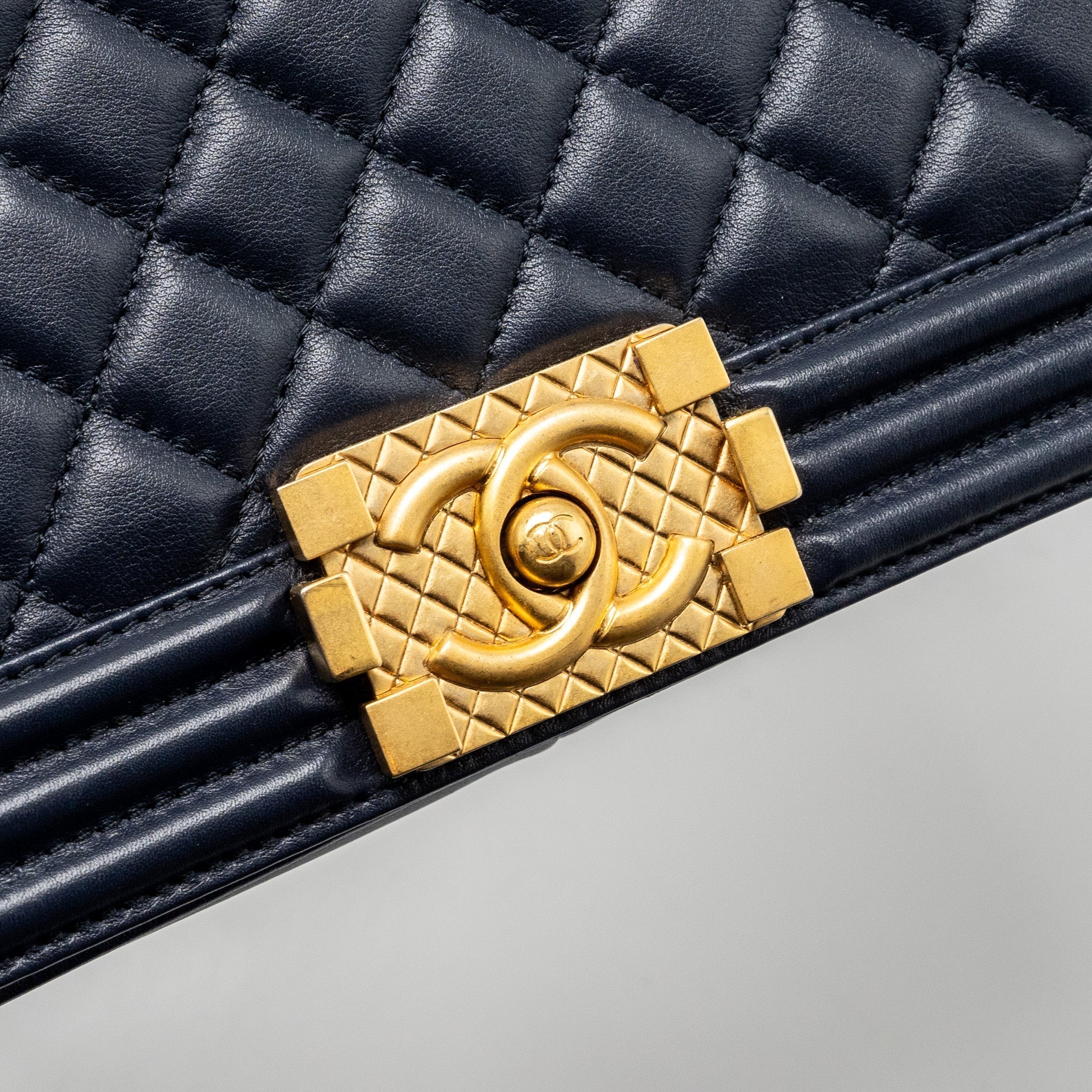 chanel-20b-medium-boy-bag-with-top-handle-calfskin-navy-ghw