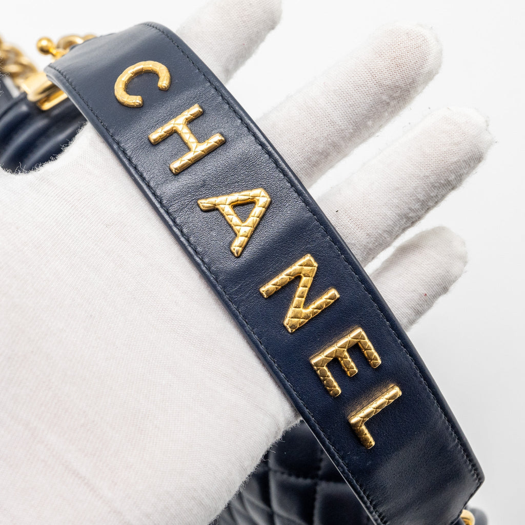 chanel-20b-medium-boy-bag-with-top-handle-calfskin-navy-ghw