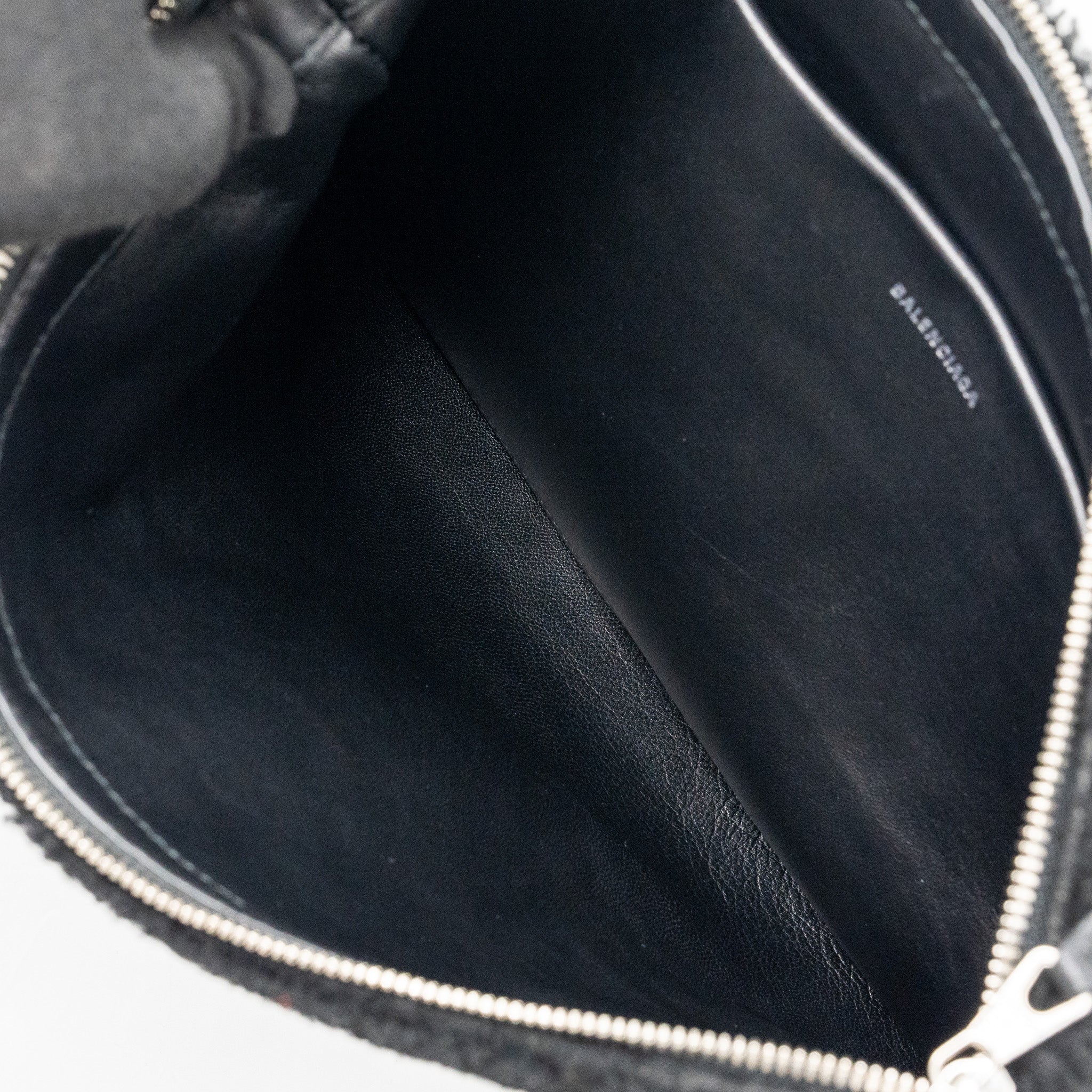 balenciaga-zip-pouch-clutch-shearling-black-white