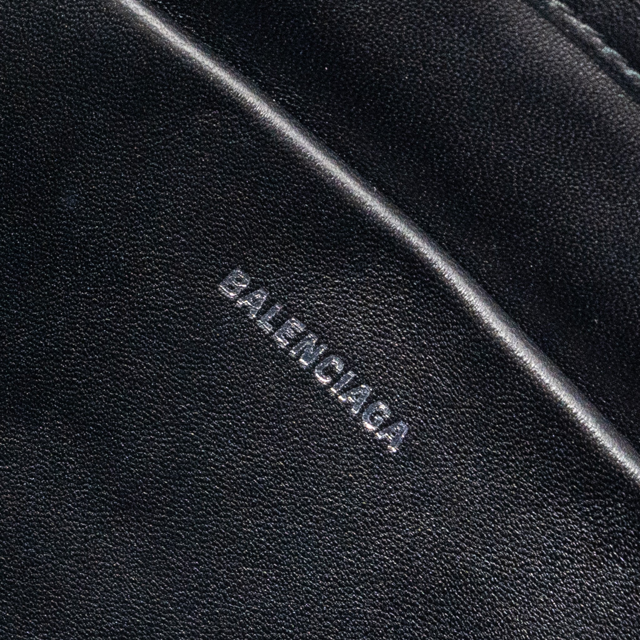 balenciaga-zip-pouch-clutch-shearling-black-white