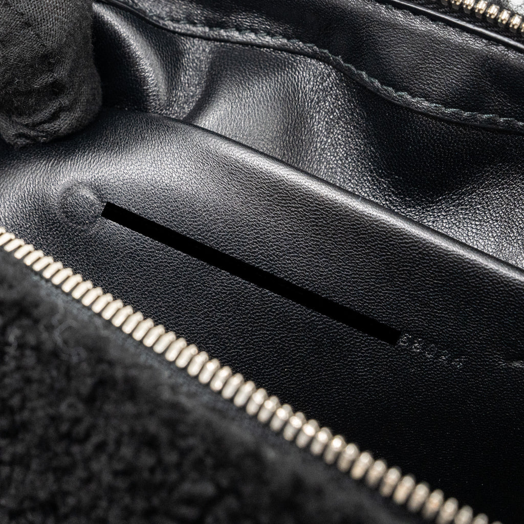 balenciaga-zip-pouch-clutch-shearling-black-white