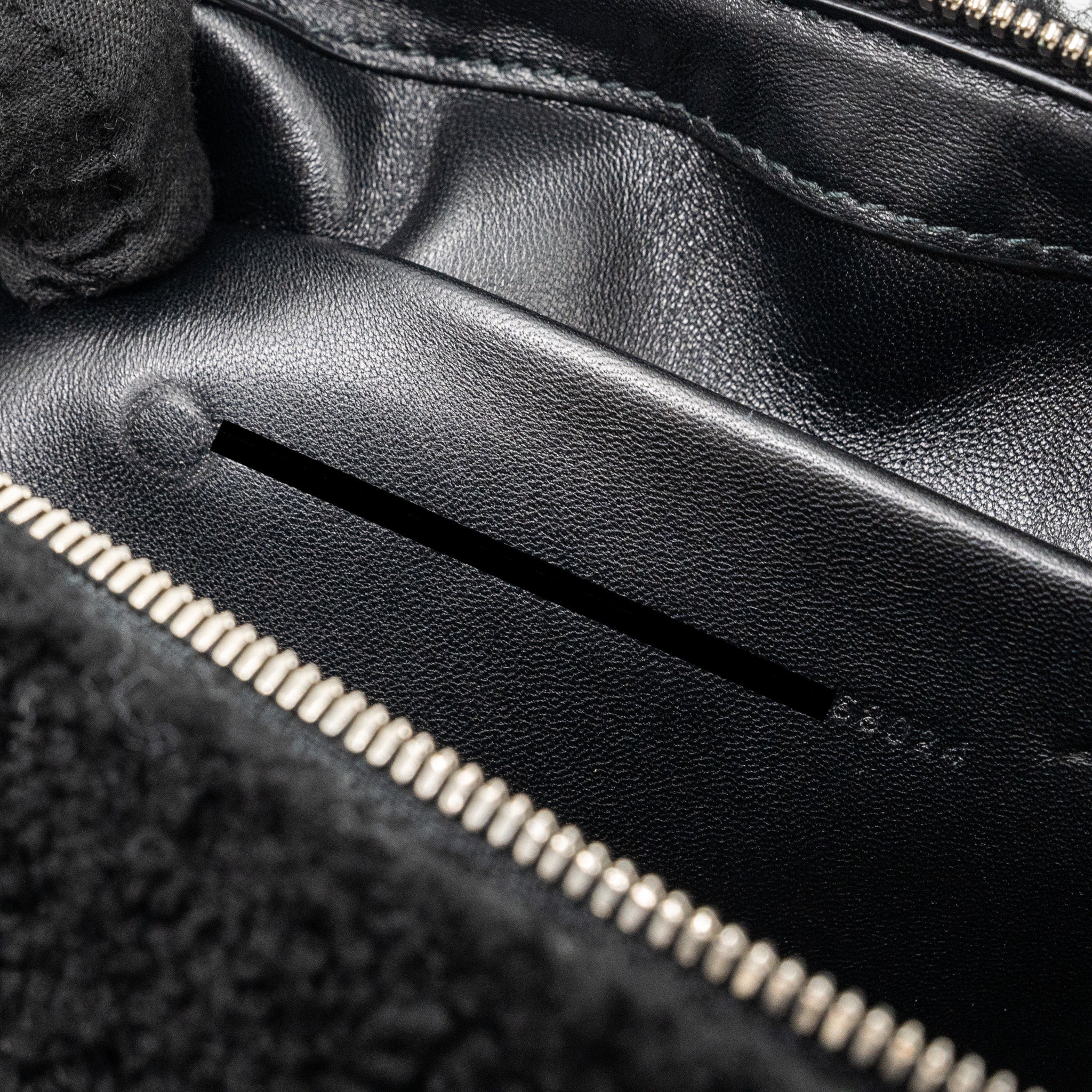 balenciaga-zip-pouch-clutch-shearling-black-white