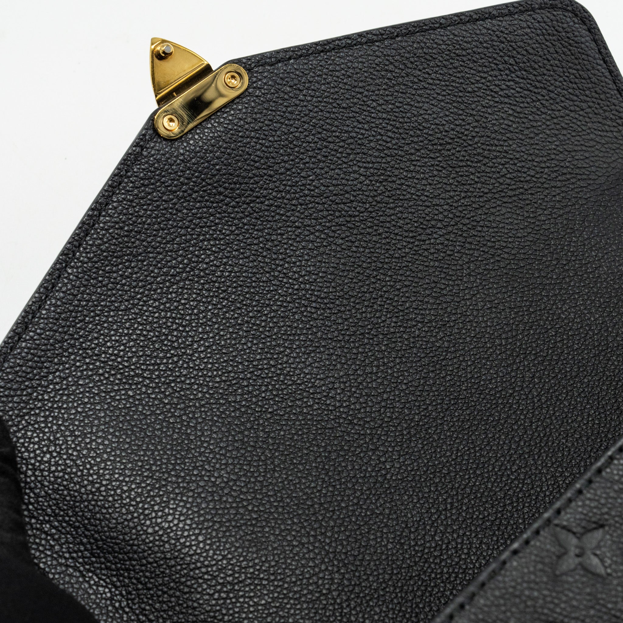 louis-vuitton-pochette-metis-monogram-empreinte-black-ghw-5