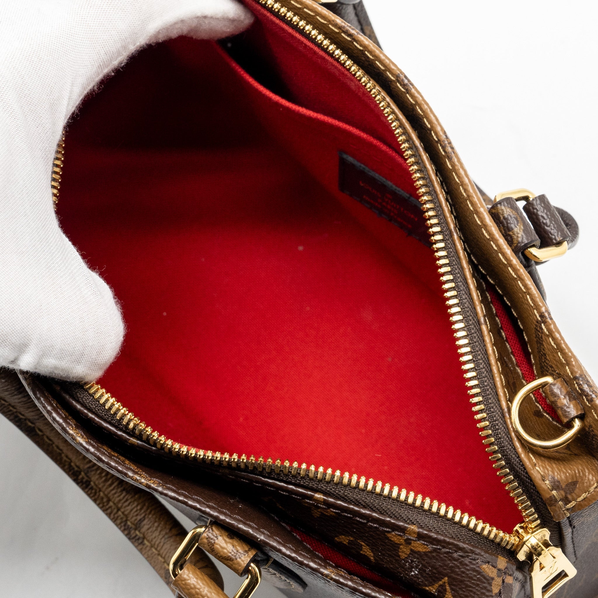 louis-vuitton-onthego-east-west-monogram-reverse-ghw