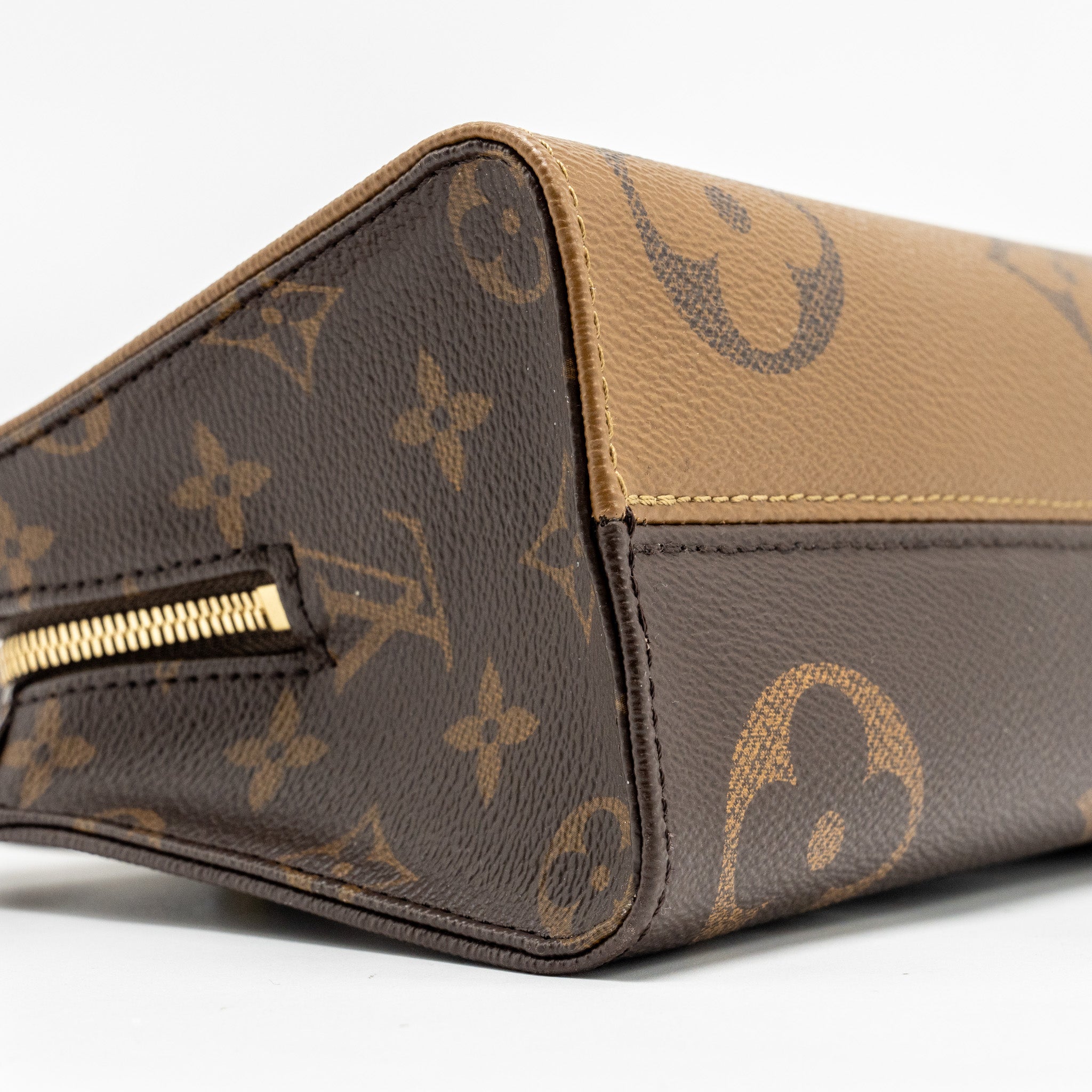 louis-vuitton-onthego-east-west-monogram-reverse-ghw