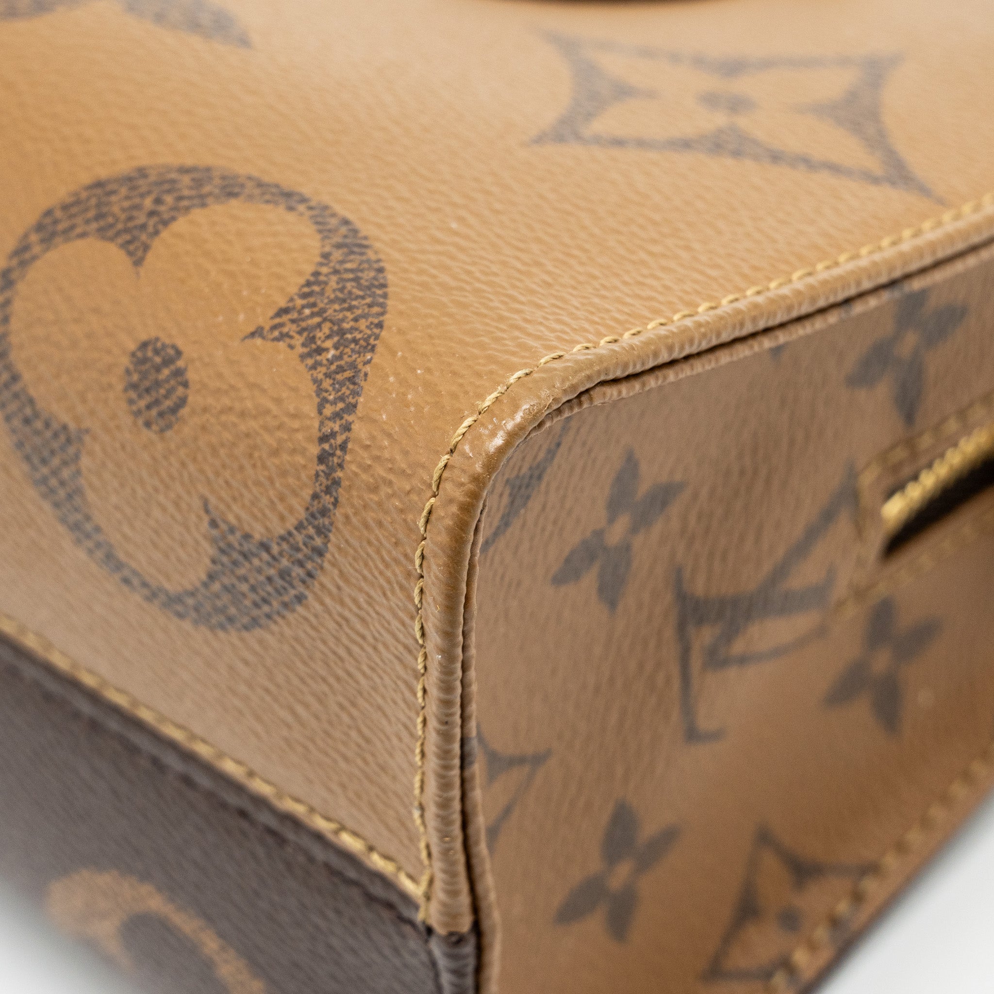 louis-vuitton-onthego-east-west-monogram-reverse-ghw