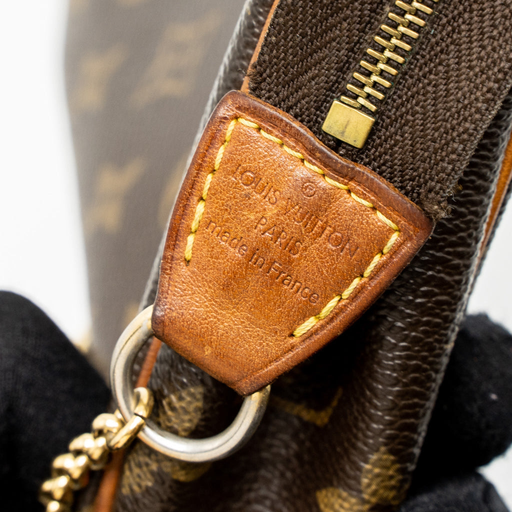 louis-vuitton-eva-pochette-bag-monogram-canvas-ghw-1