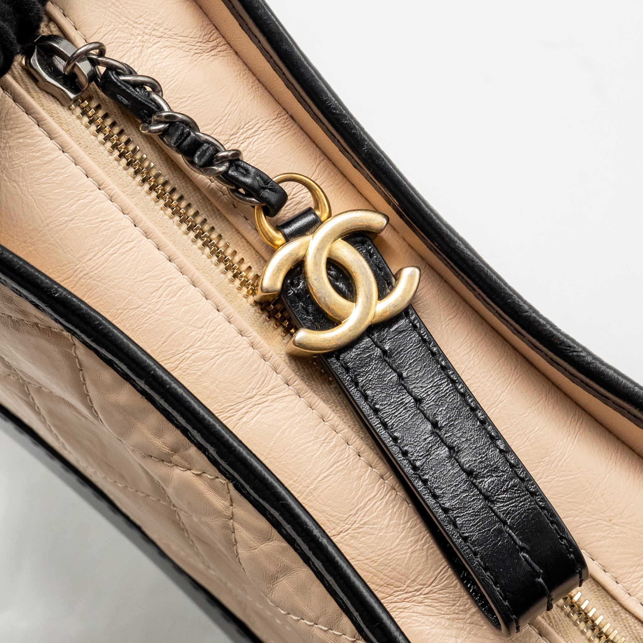 chanel-small-gabrielle-hobo-bag-aged-calfskin-beige-black-multicoloured-hardware-1