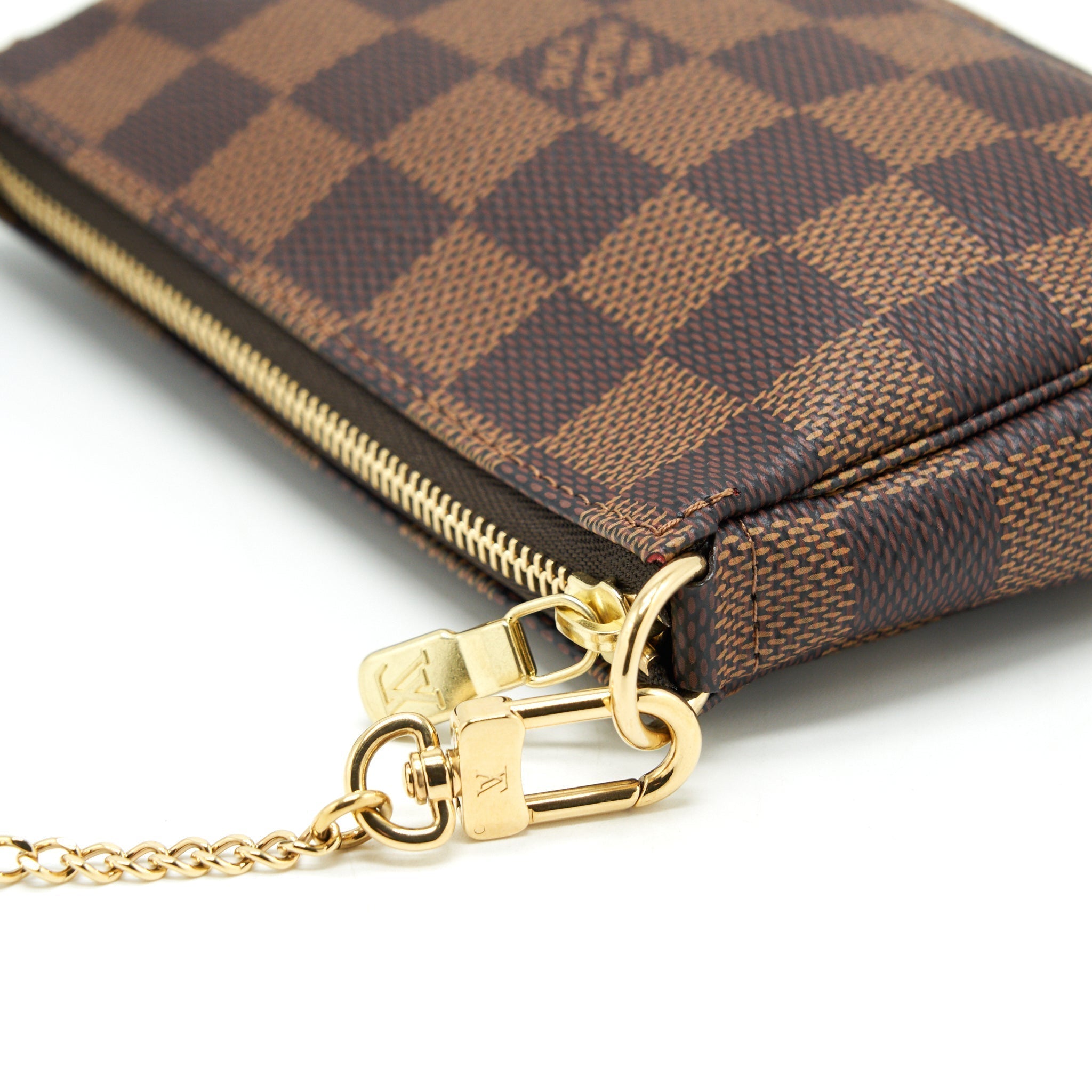 louis-vuitton-mini-pochette-accessories-damier-ebene-canvas