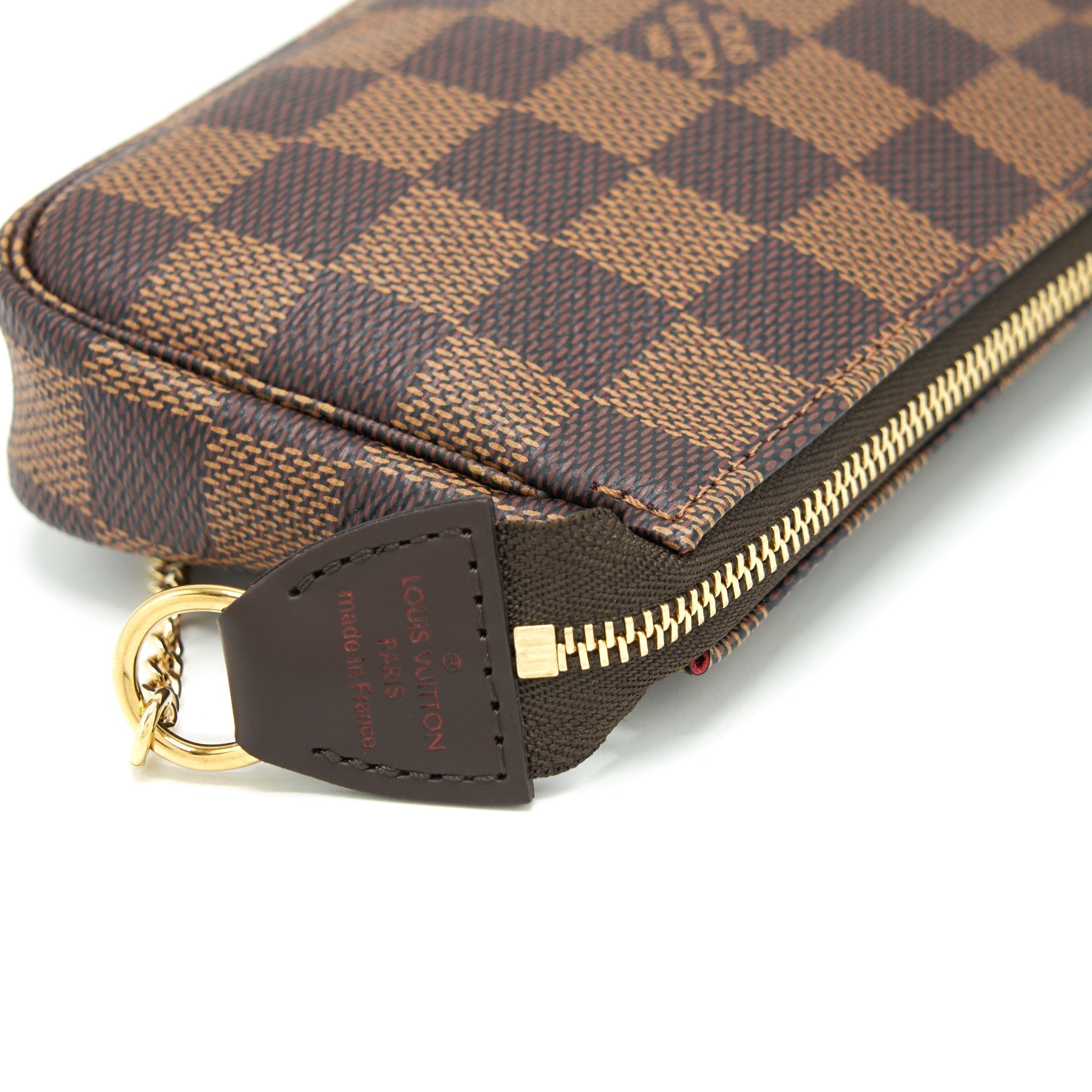 louis-vuitton-mini-pochette-accessories-damier-ebene-canvas