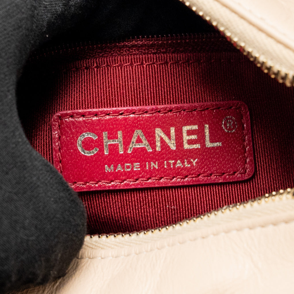 chanel-small-gabrielle-hobo-bag-aged-calfskin-beige-black-multicoloured-hardware-1