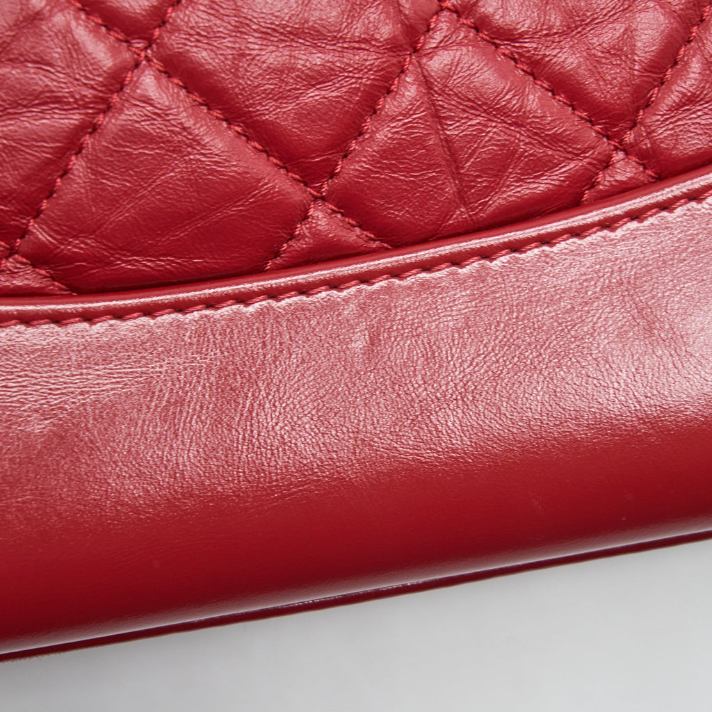 chanel-small-gabrielle-backpack-aged-calfskin-red-with-gold-sliver-hardware