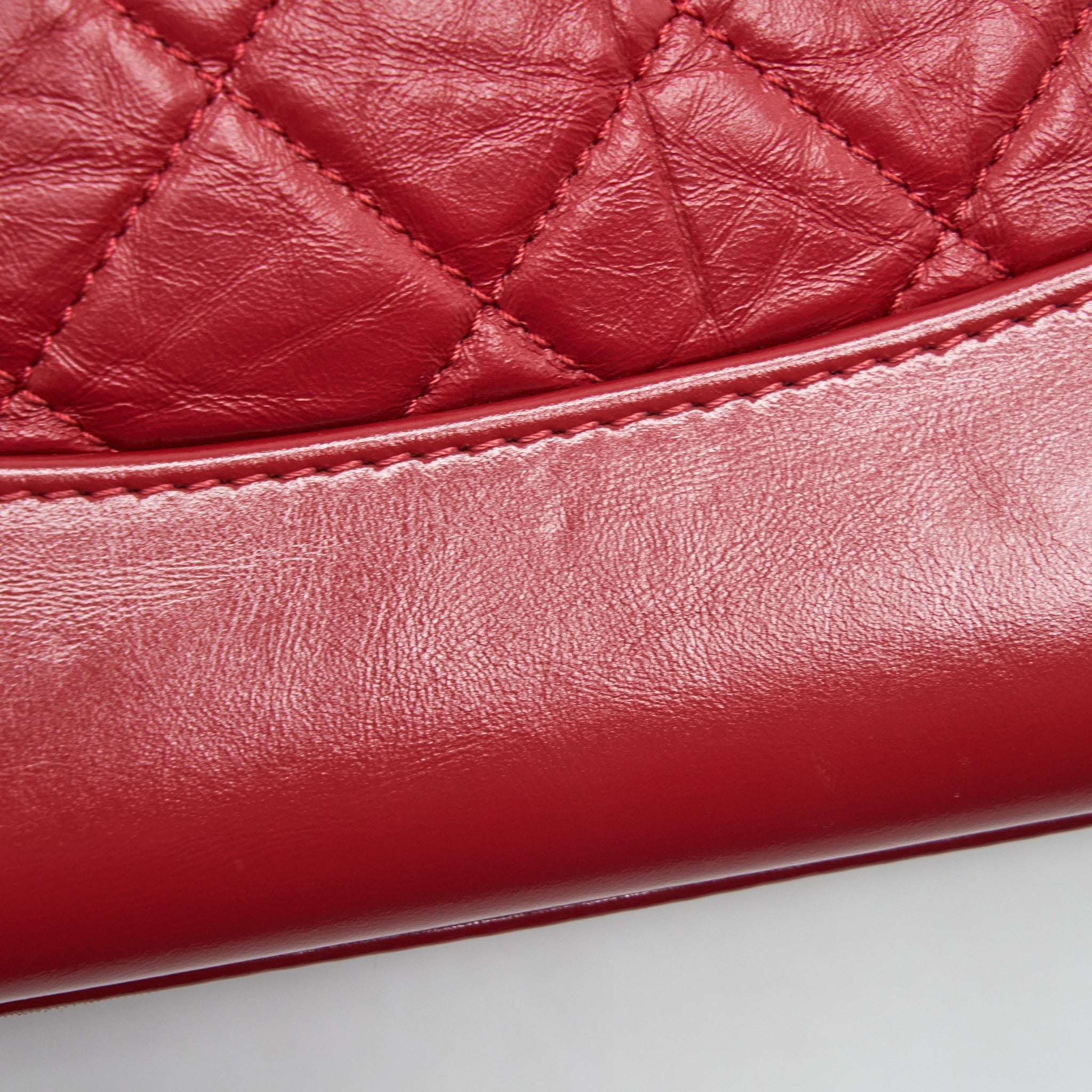 chanel-small-gabrielle-backpack-aged-calfskin-red-with-gold-sliver-hardware
