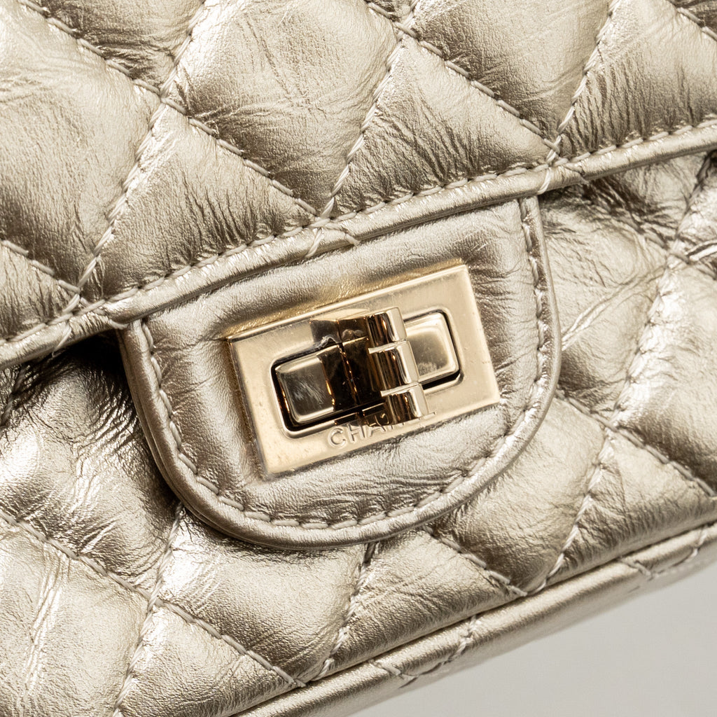 chanel-small-2-55-reissue-double-flap-bag-aged-calfskin-metallic-light-gold-with-lghw