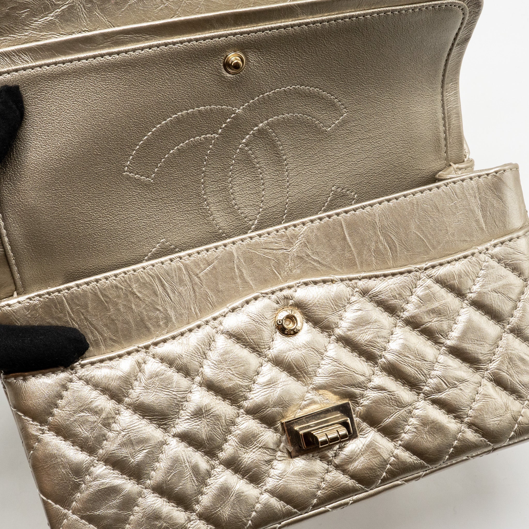 chanel-small-2-55-reissue-double-flap-bag-aged-calfskin-metallic-light-gold-with-lghw