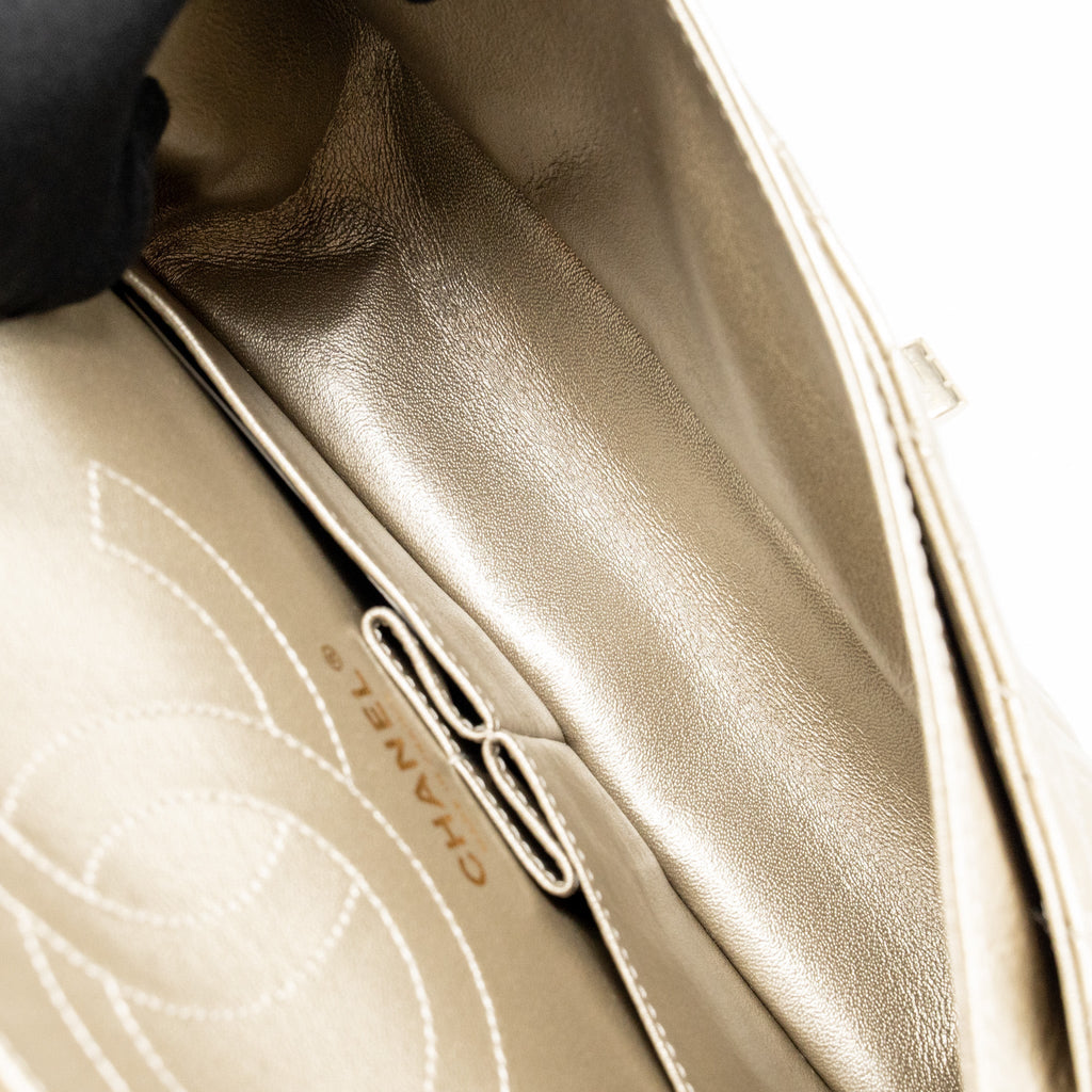 chanel-small-2-55-reissue-double-flap-bag-aged-calfskin-metallic-light-gold-with-lghw