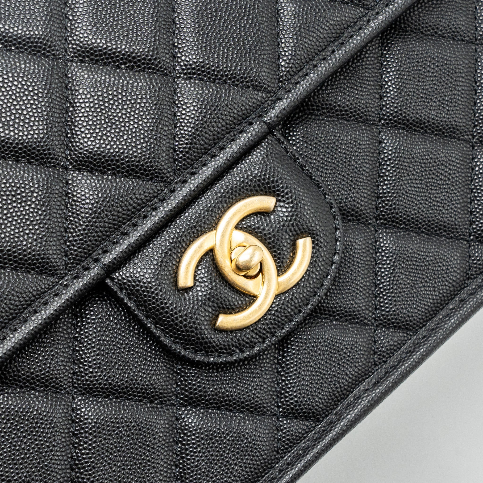 chanel-22k-large-backpack-caviar-black-ghwmicrochip
