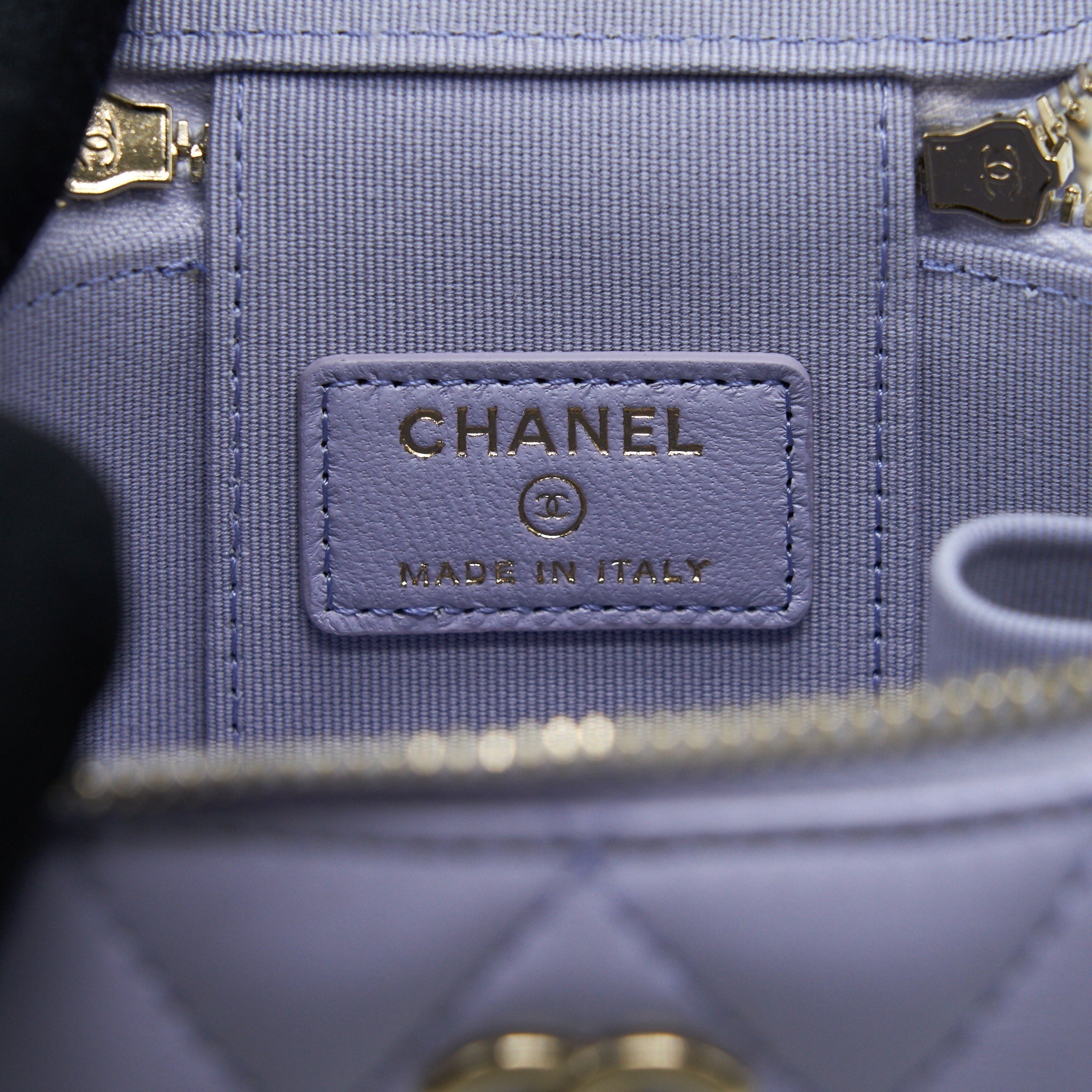 chanel-21k-mini-top-handle-vanity-with-chain-light-purple-lghw