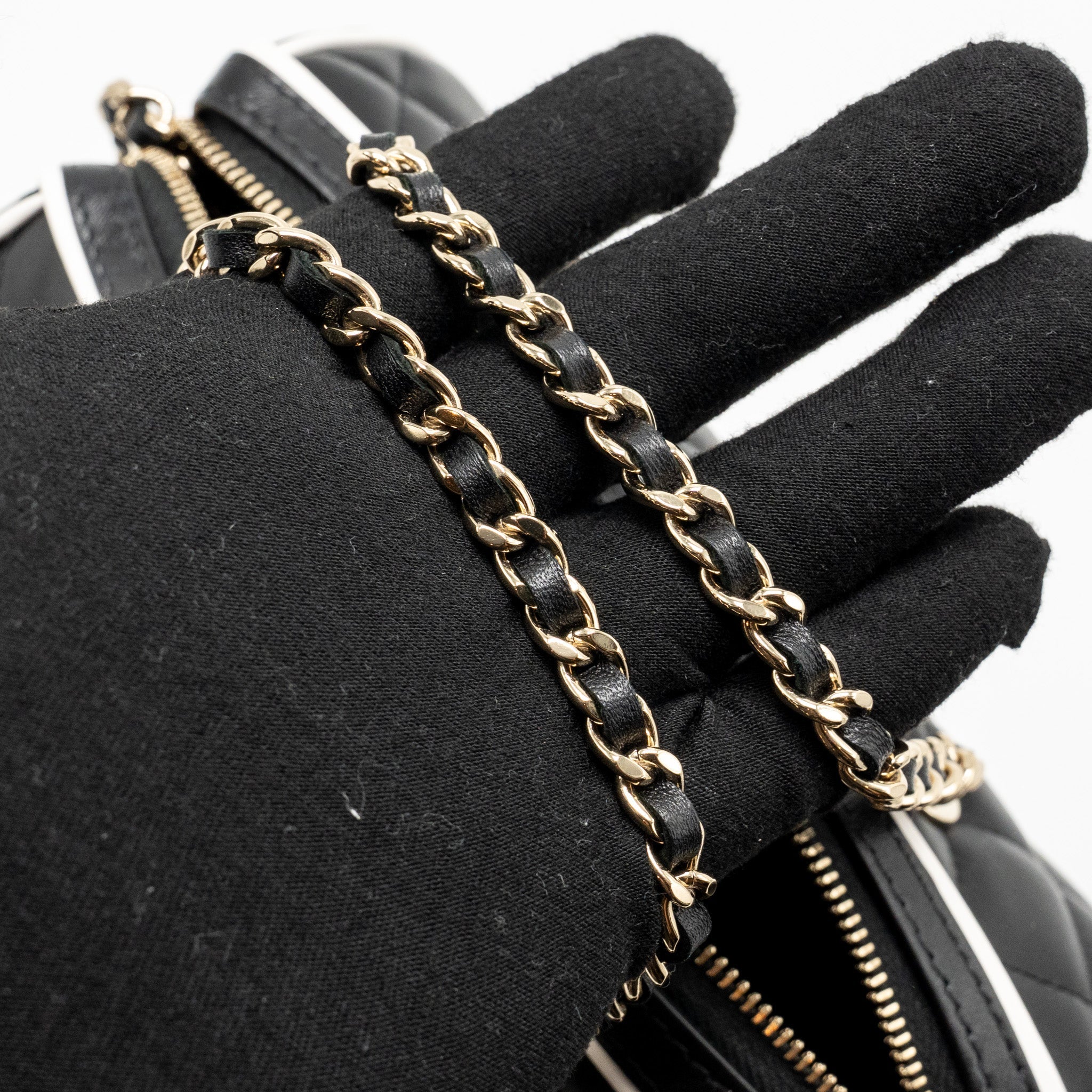 chanel-quilted-bowling-bag-lambskin-black-lghw-microchip