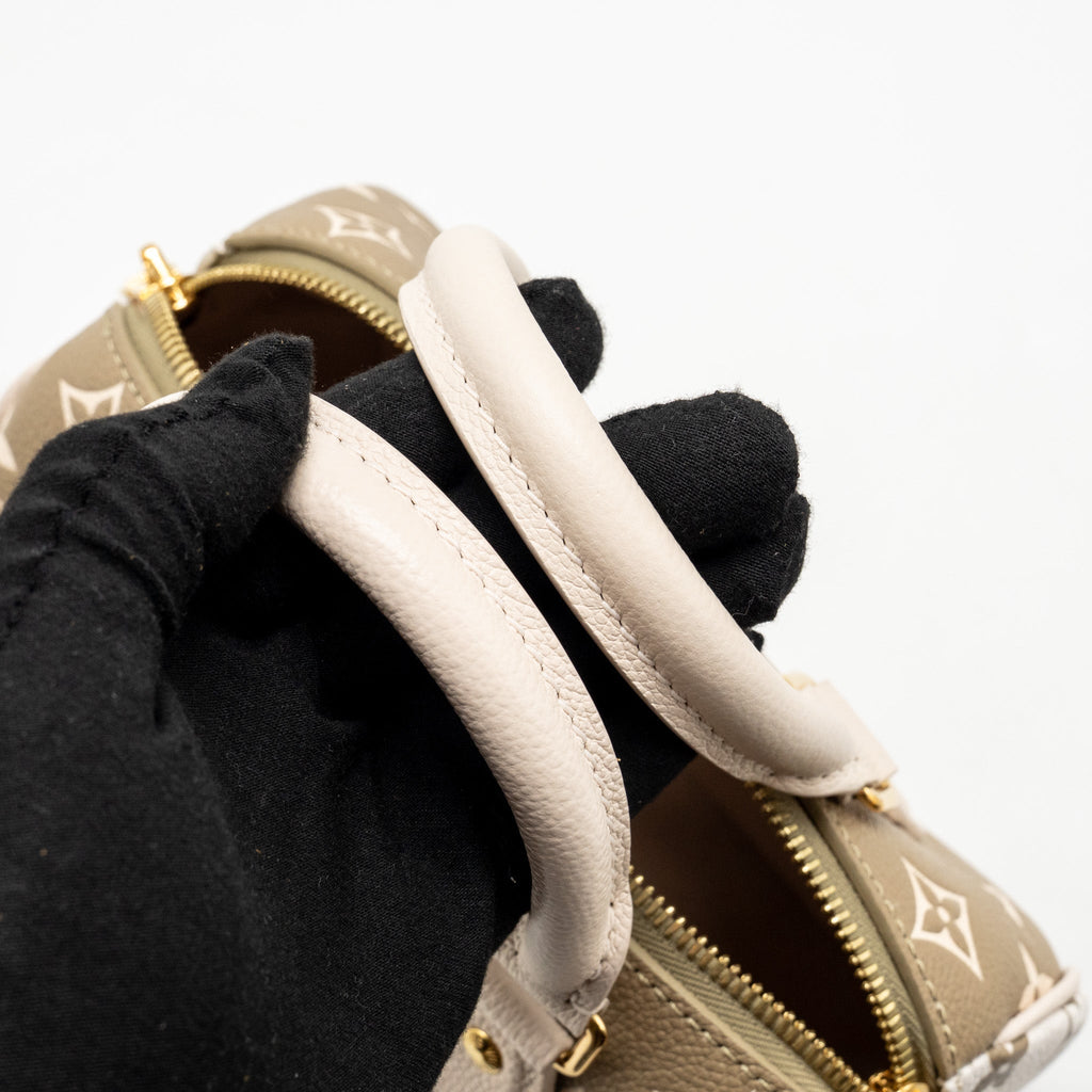 louis-vuitton-speedy-20-bandouliere-bicolour-monogram-empreinte-leather-khaki-beige-ghw-copy