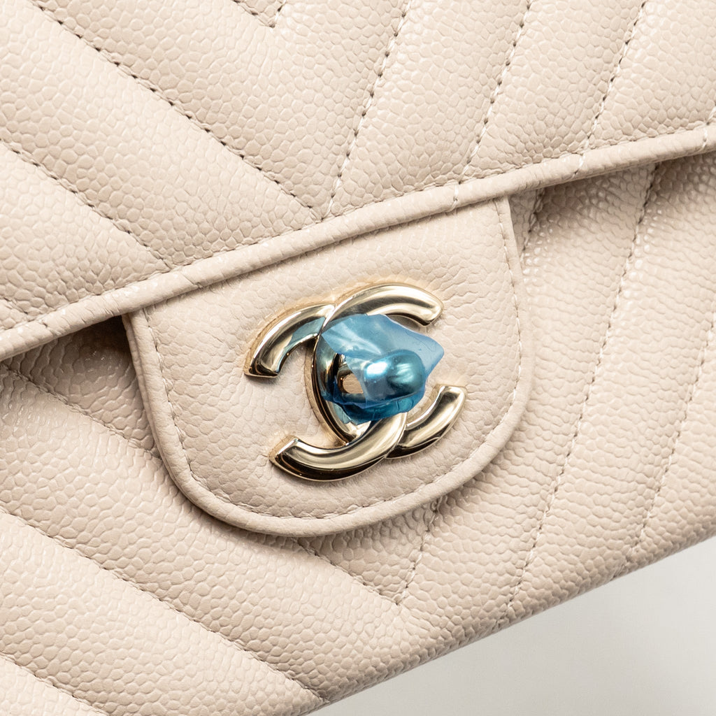 chanel-medium-classic-double-flap-bag-chevron-caviar-light-beige-lghw