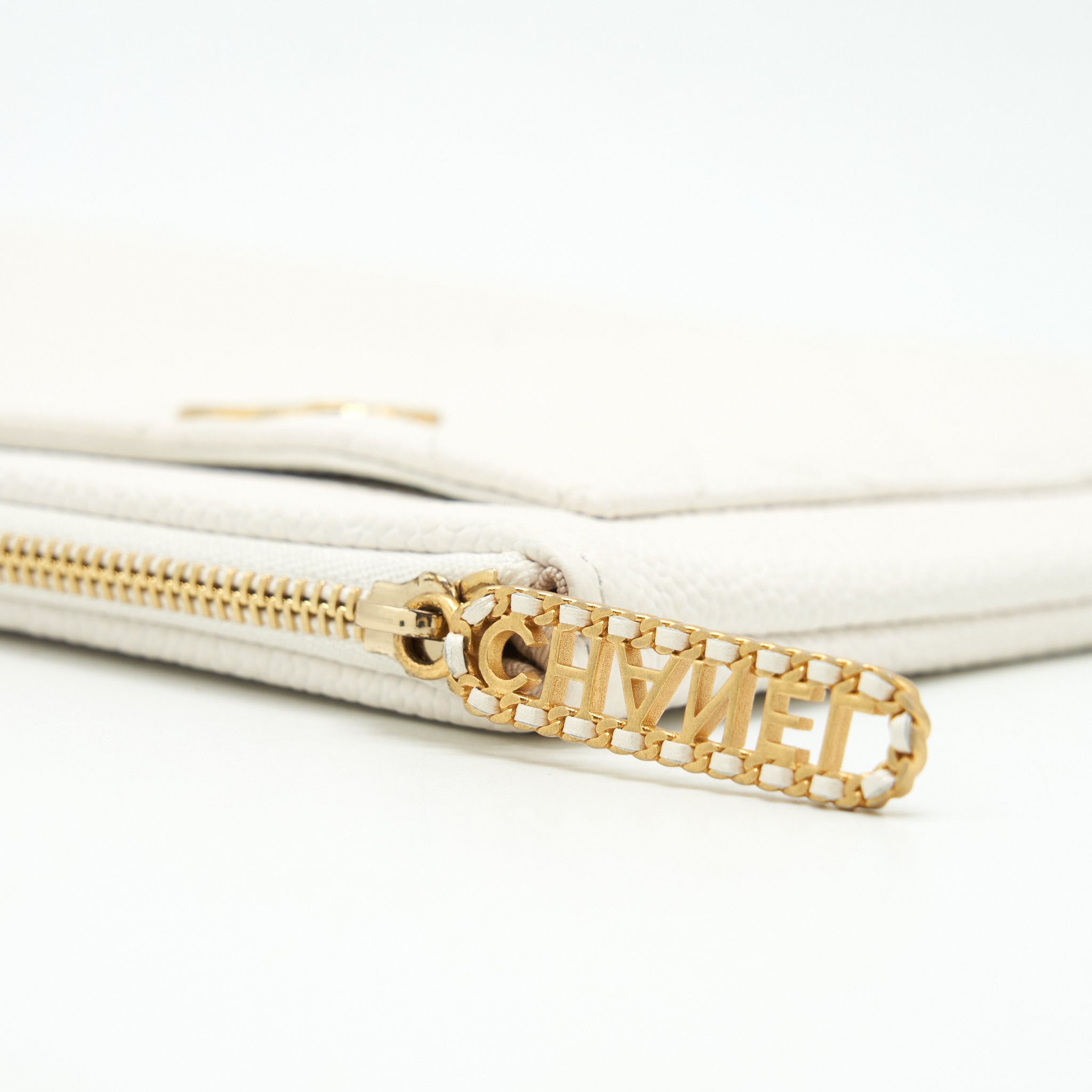 chanel-seasonal-zippy-pouch-caviar-white-ghw