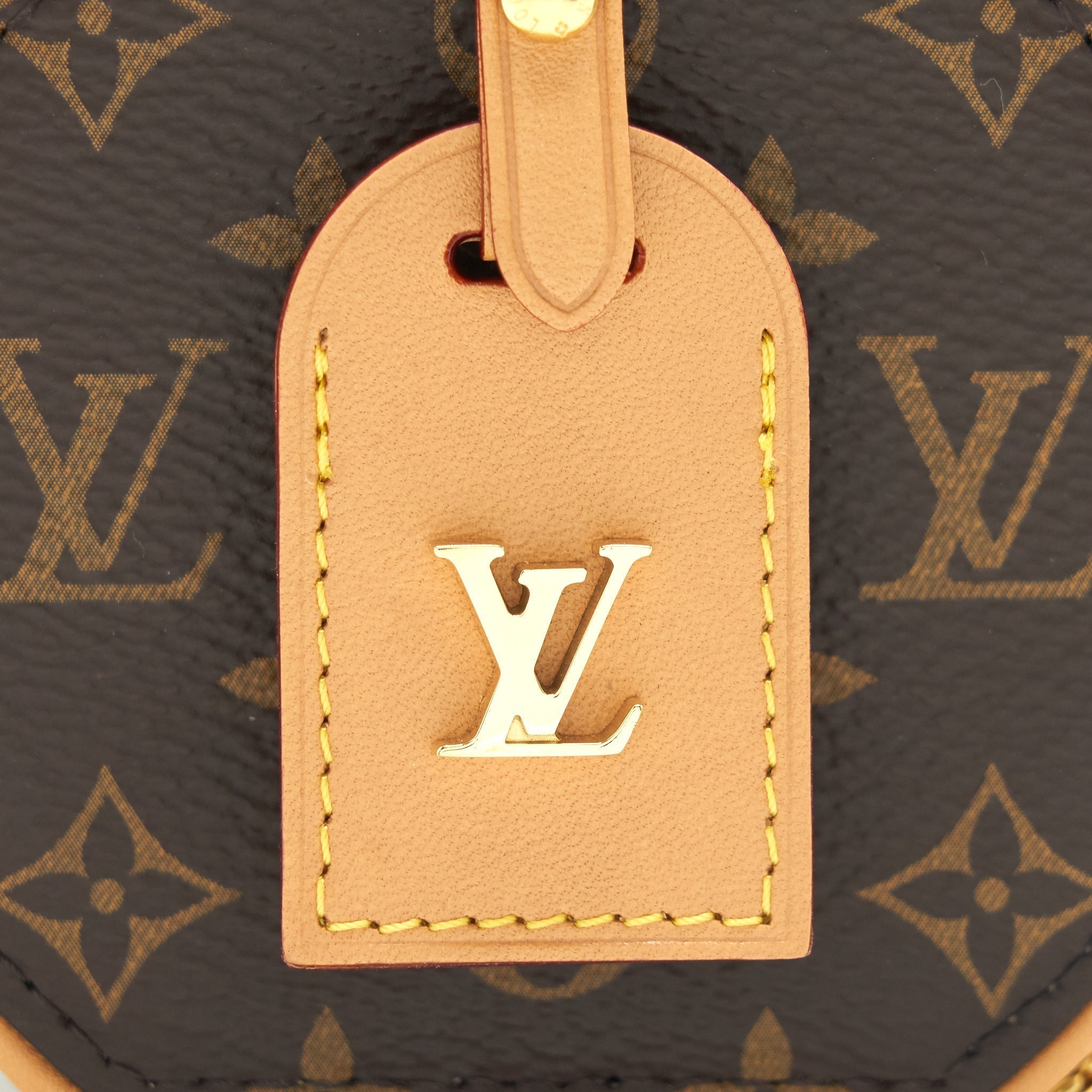 louis-vuitton-petite-boite-chapeau-necklace-monogram-canvas
