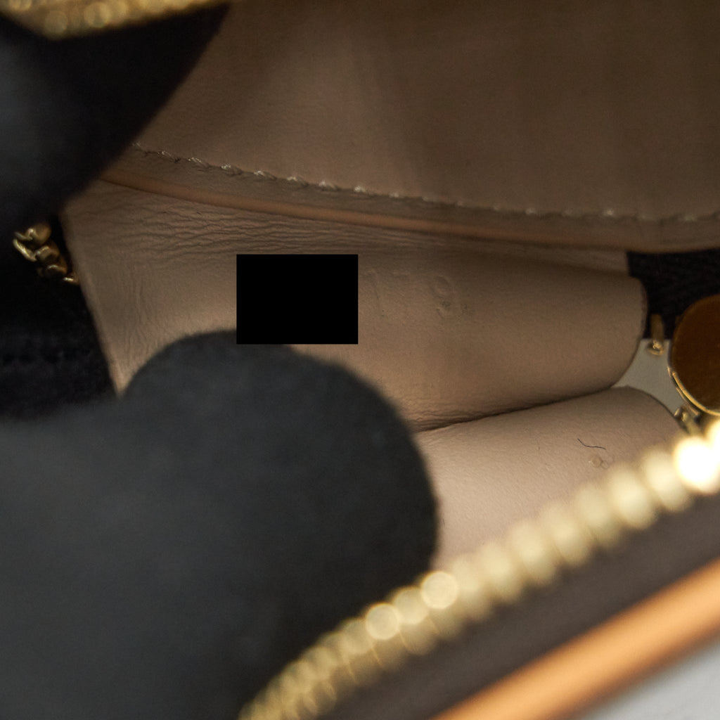 louis-vuitton-petite-boite-chapeau-necklace-monogram-canvas