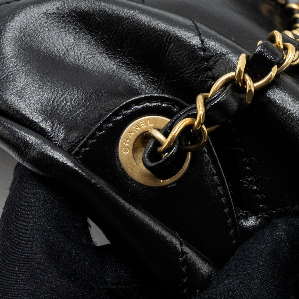 chanel-22-backpack-shiny-calfskin-black-ghwmicrochip