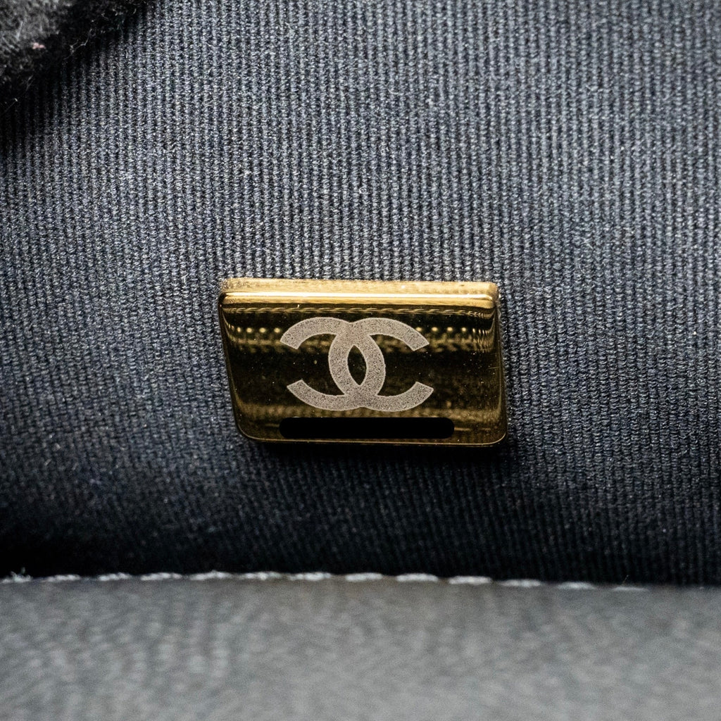 chanel-22k-mini-flap-bag-with-top-handle-shiny-grained-calfskin-black-ghw-microchip-copy