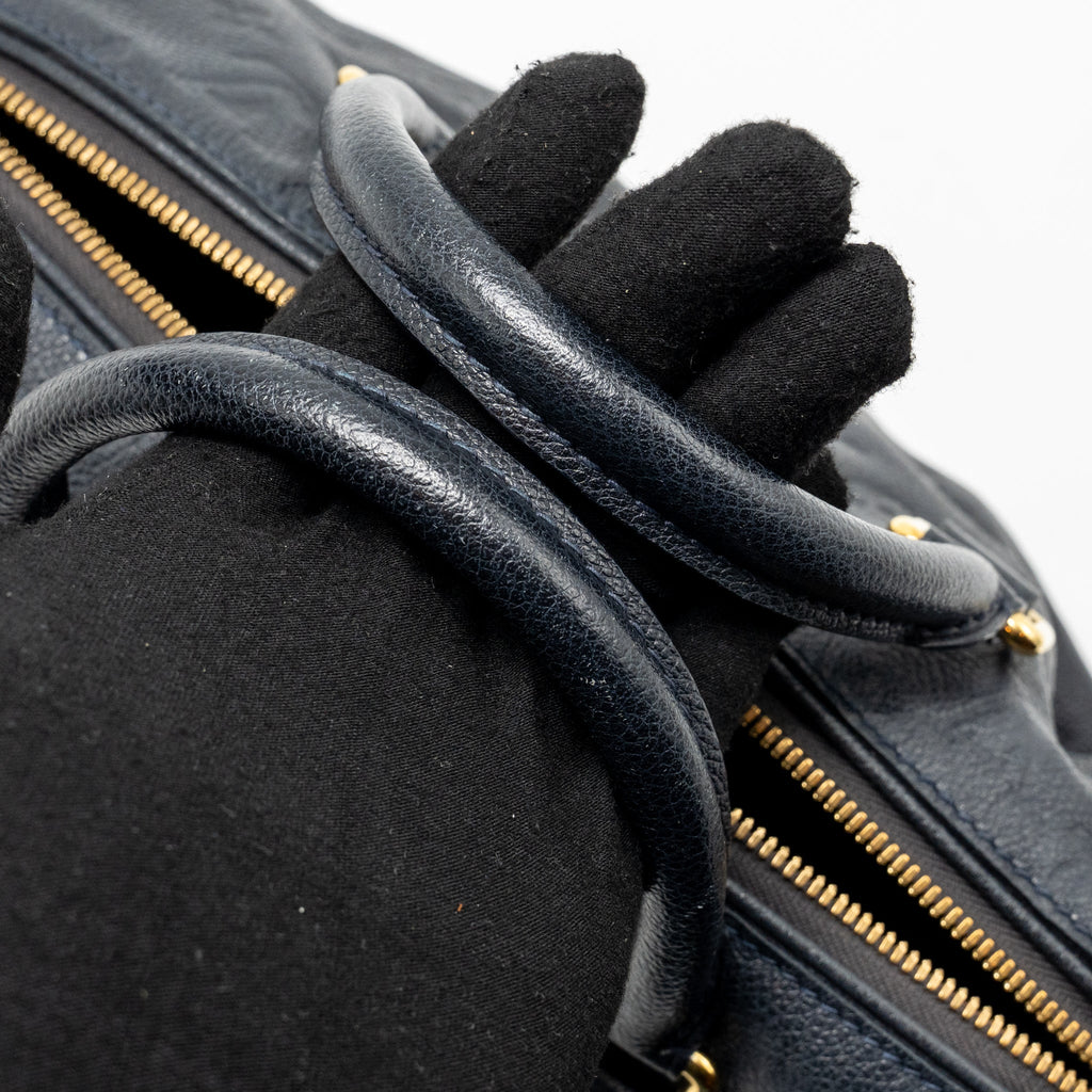 louis-vuitton-speedy-bandouliere-25-monogram-empreinte-leather-navy-ghw