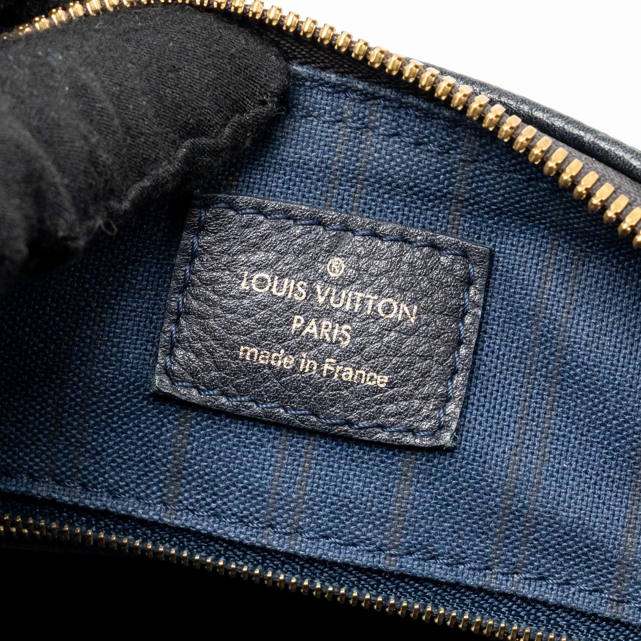 louis-vuitton-speedy-bandouliere-25-monogram-empreinte-leather-navy-ghw