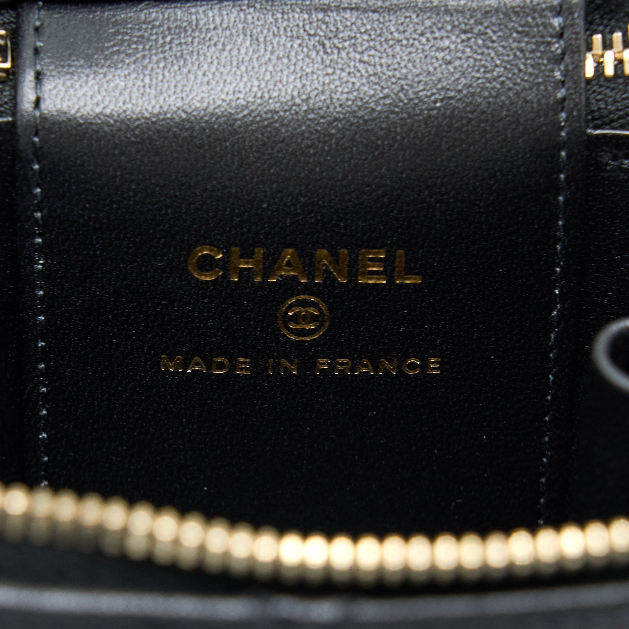 chanel-22b-detailed-top-handle-mini-vanity-with-chain-lambskin-black-brushed-ghw