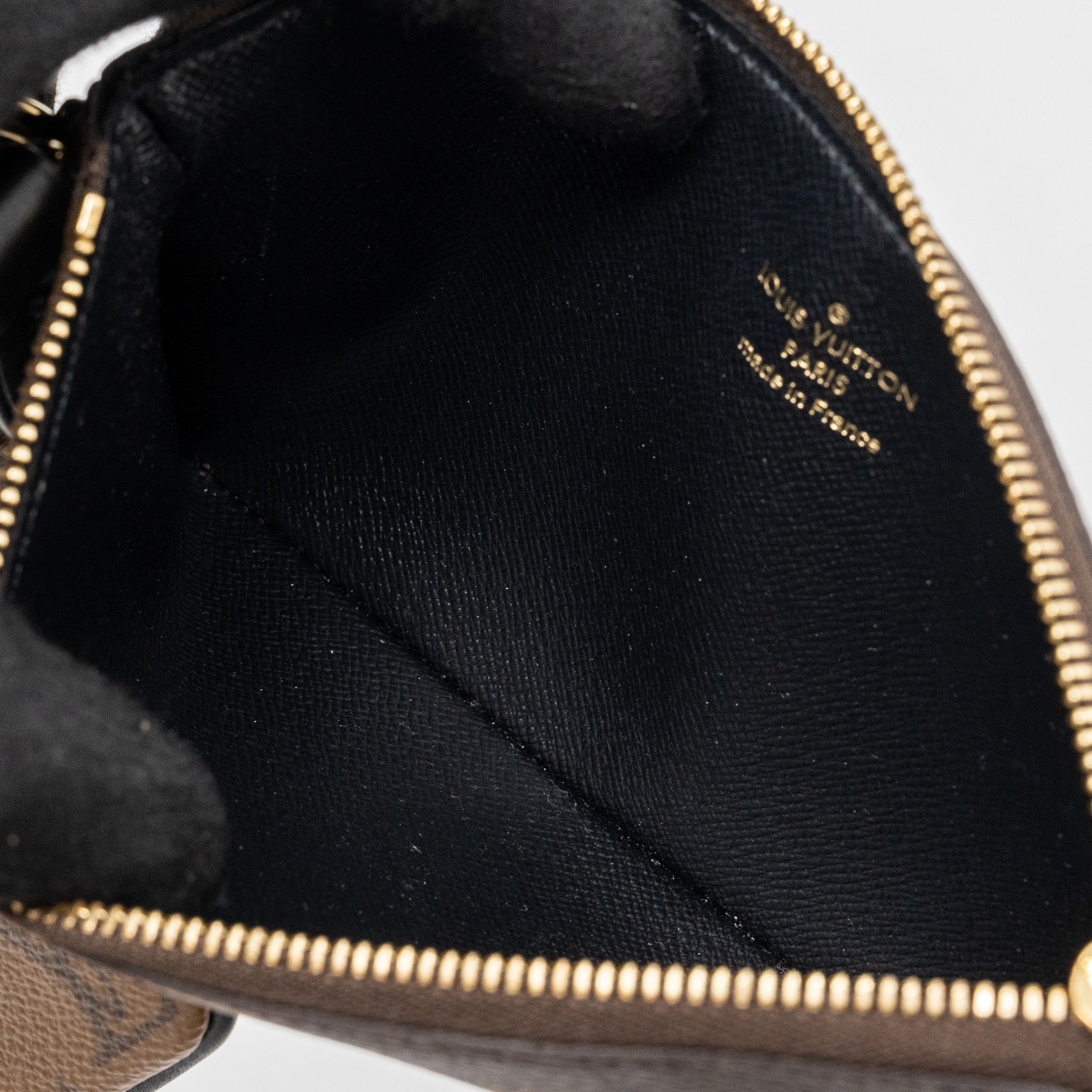 louis-vuitton-trio-pouch-monogram-canvas-ghw