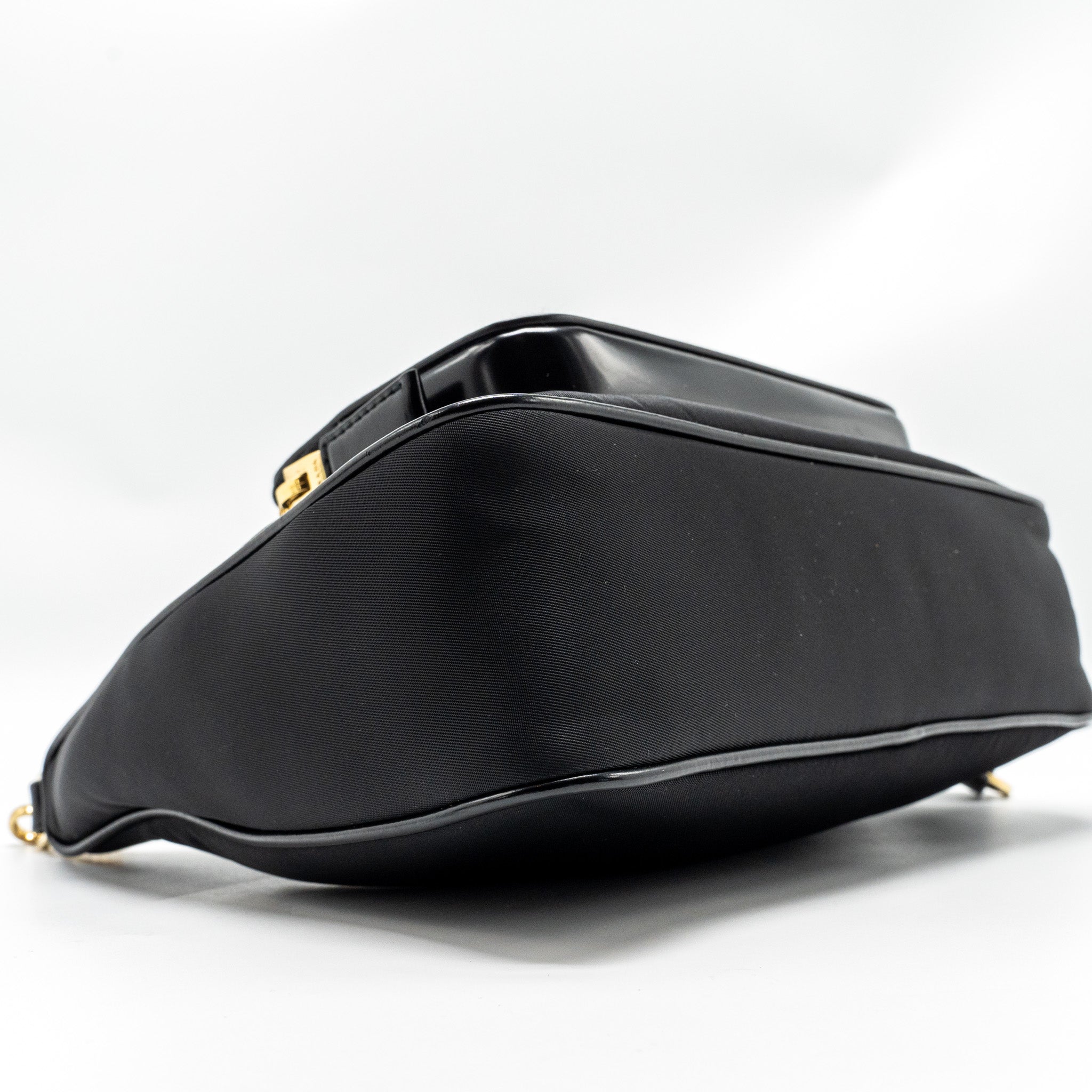 prada-re-nylon-mini-bag-nylon-calfskin-black-ghw