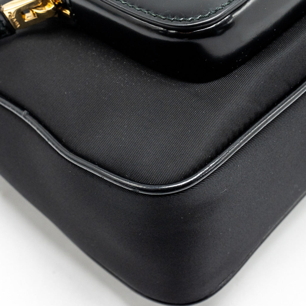 prada-re-nylon-mini-bag-nylon-calfskin-black-ghw