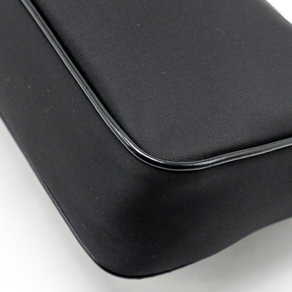 prada-re-nylon-mini-bag-nylon-calfskin-black-ghw