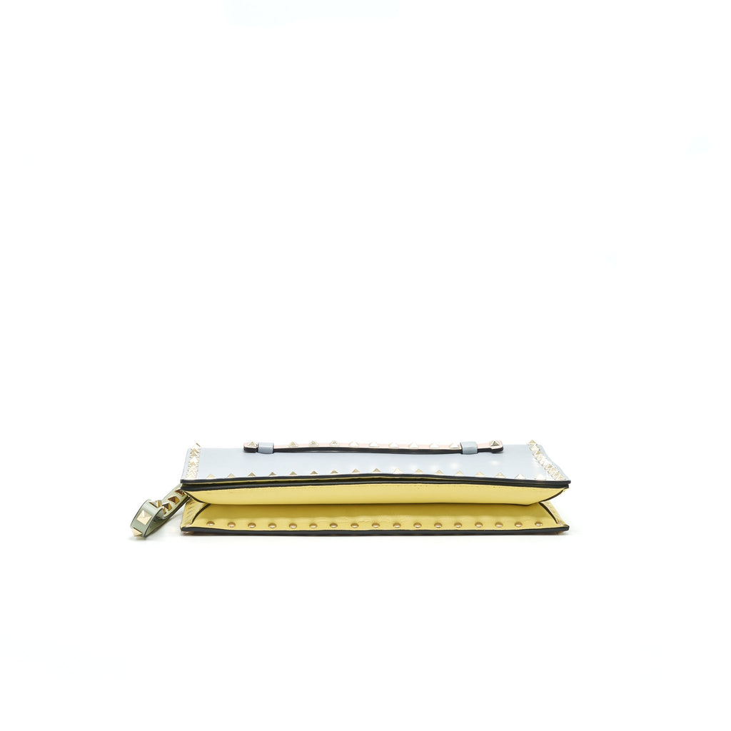 valentino-garavani-rockstud-leather-clutch-bag-multicolored