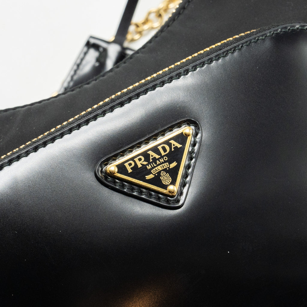 prada-re-nylon-mini-bag-nylon-calfskin-black-ghw