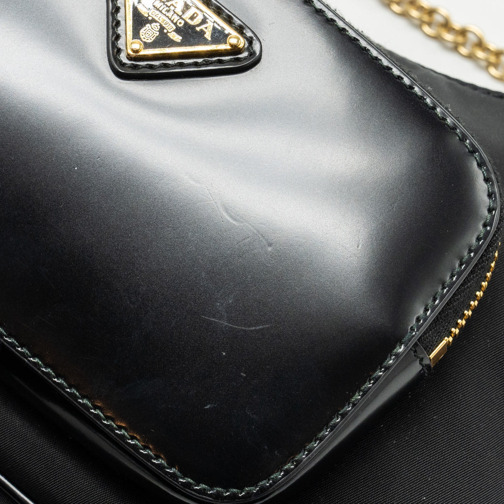 prada-re-nylon-mini-bag-nylon-calfskin-black-ghw