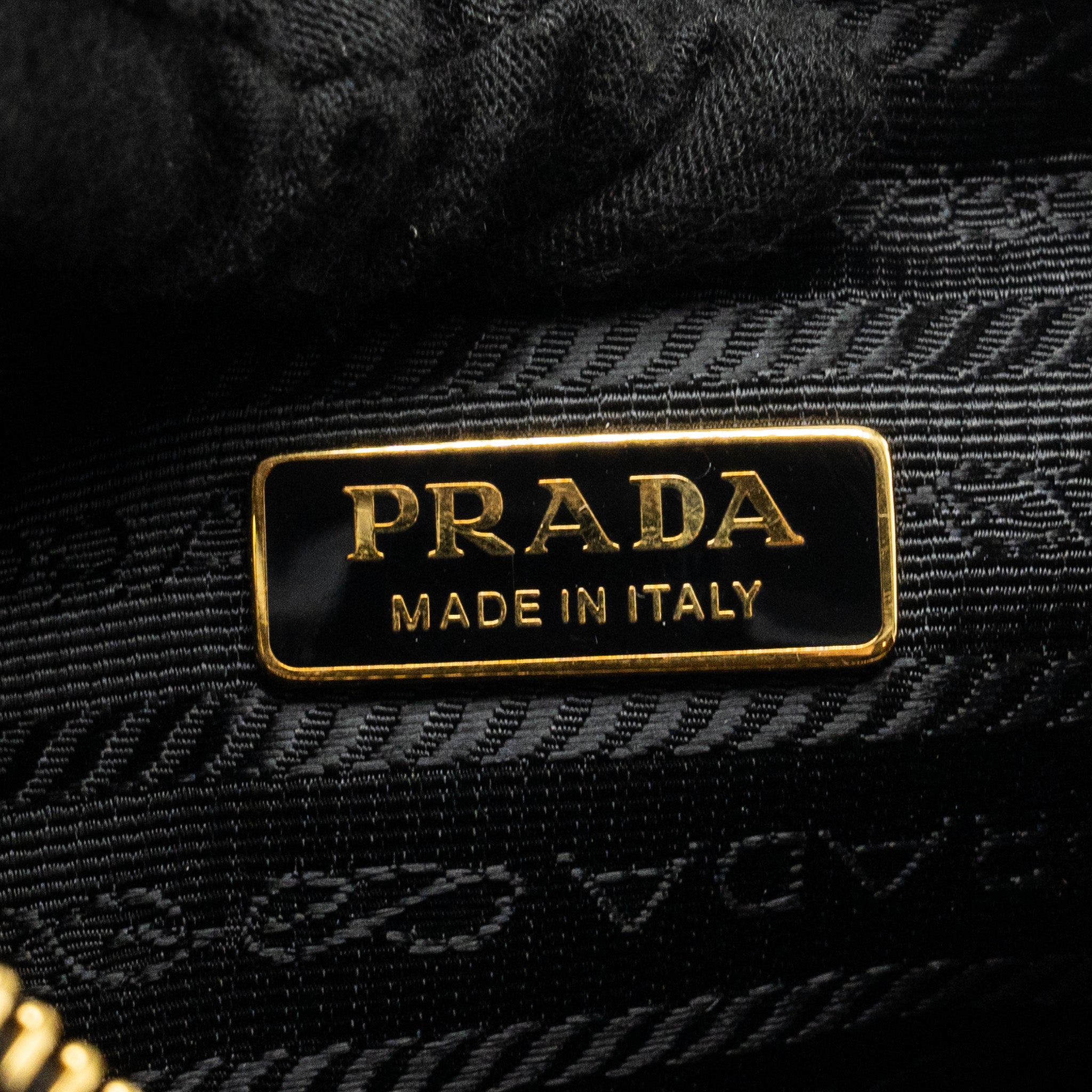 prada-re-nylon-mini-bag-nylon-calfskin-black-ghw
