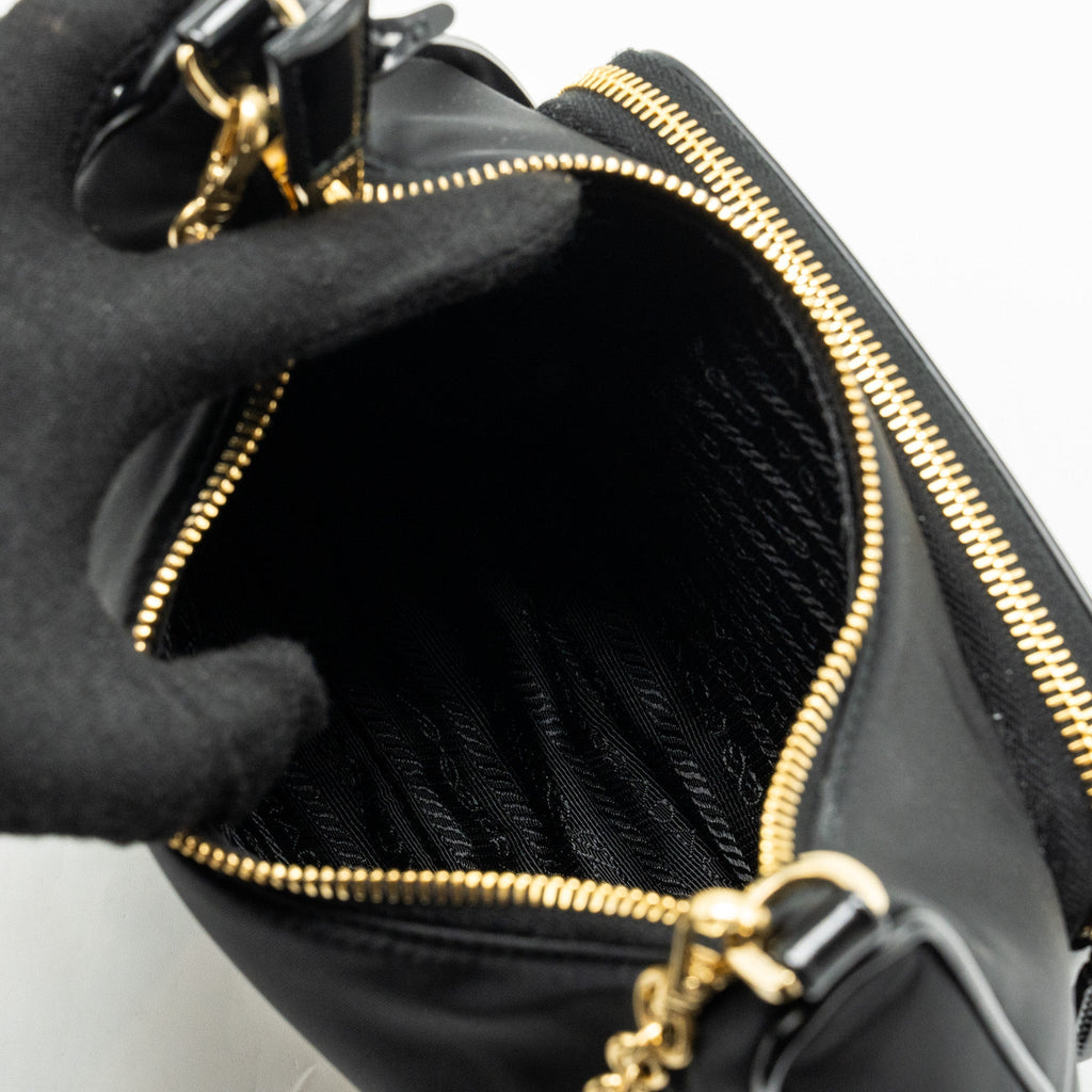 prada-re-nylon-mini-bag-nylon-calfskin-black-ghw