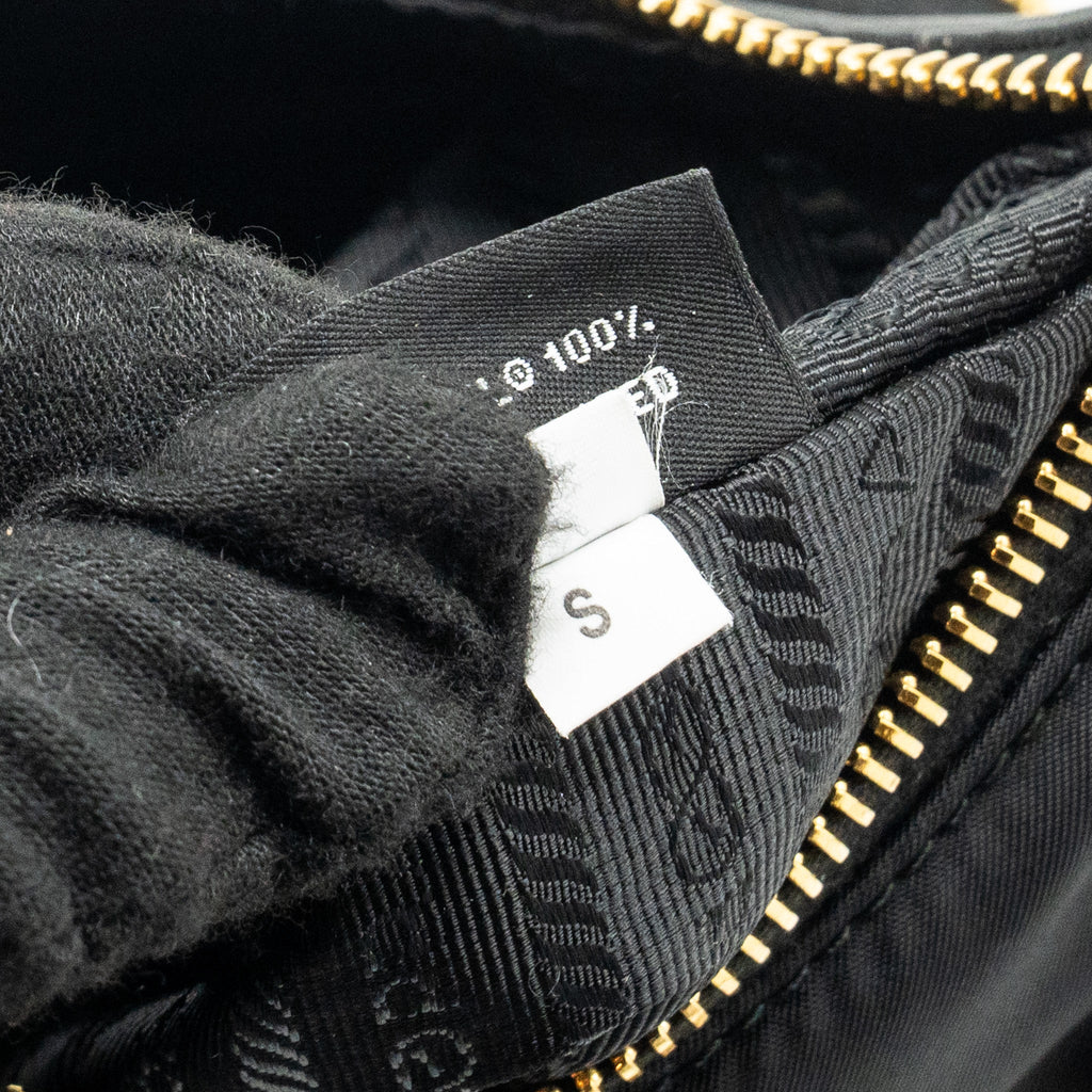 prada-re-nylon-mini-bag-nylon-calfskin-black-ghw