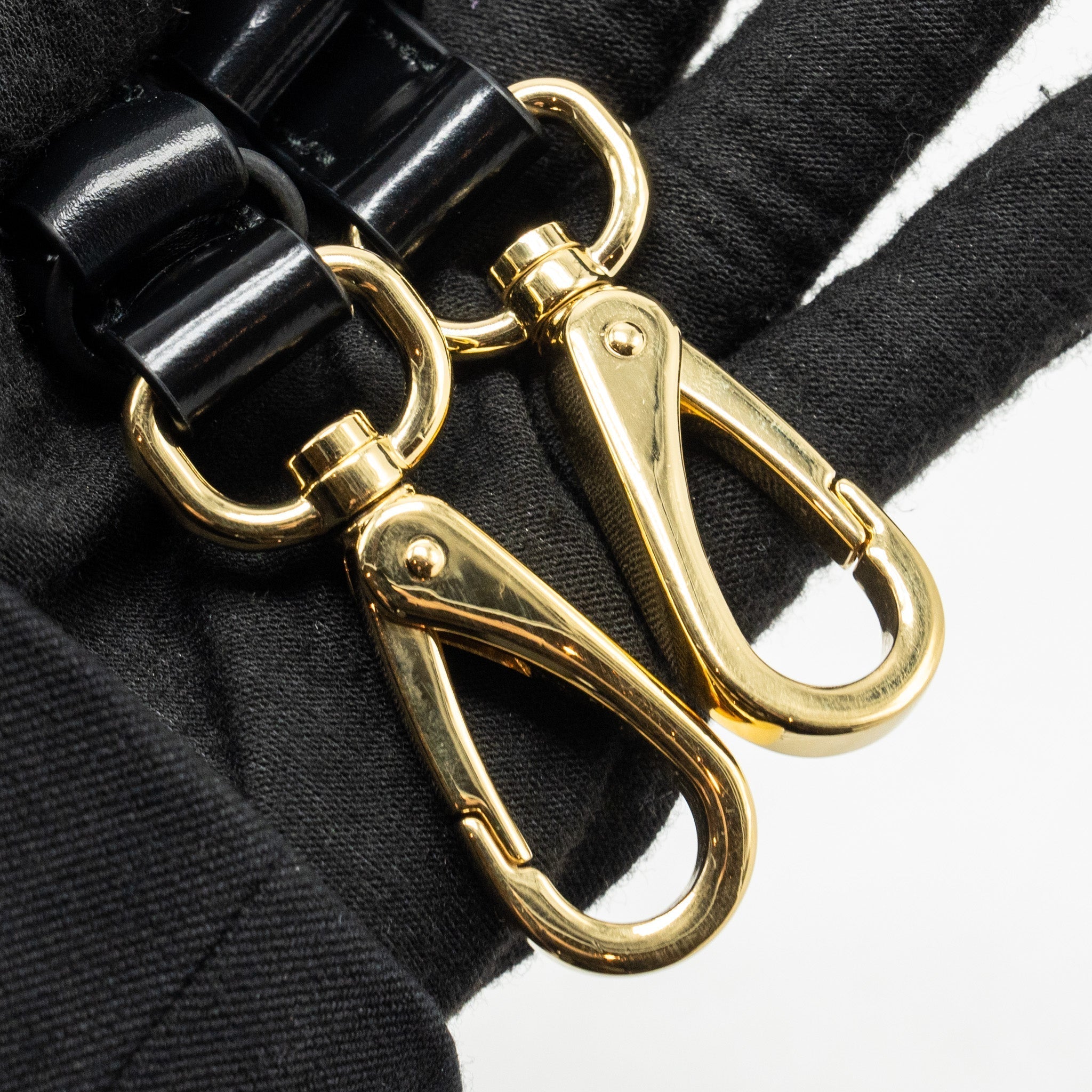 prada-re-nylon-mini-bag-nylon-calfskin-black-ghw